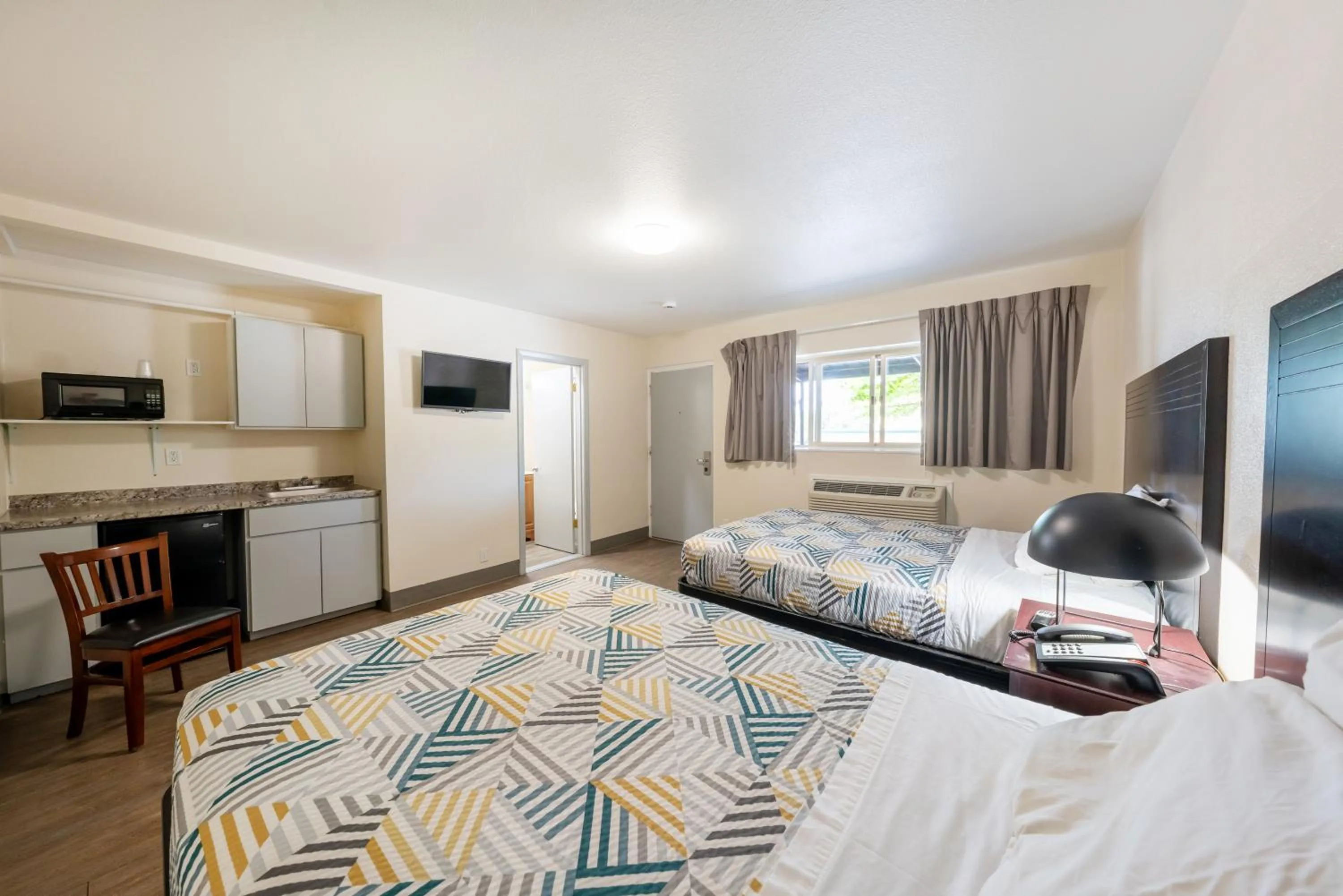 Bedroom, Bed in Banfield Studios By OYO Portland OR