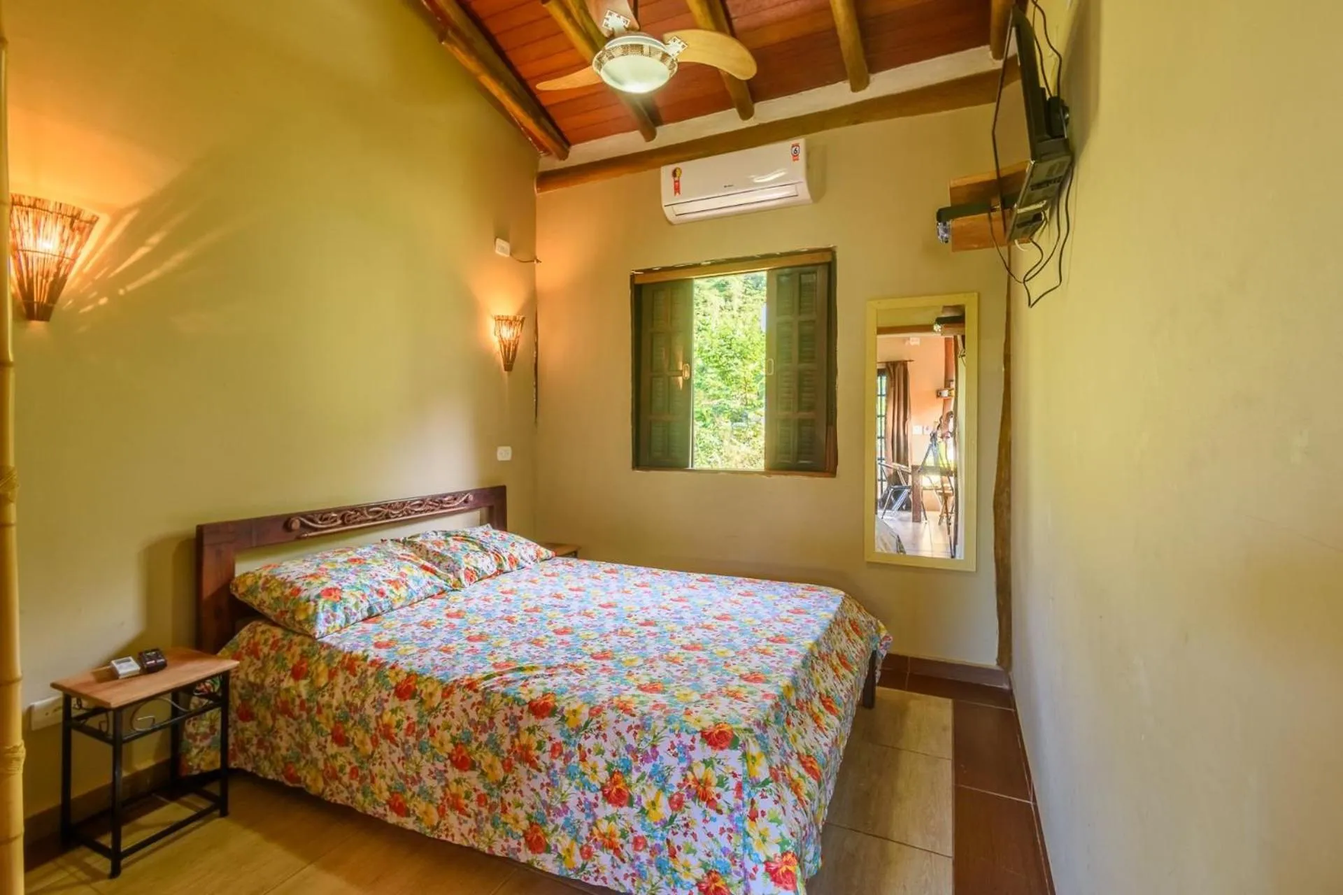 Bedroom in Chalés Yababali Lagoinha