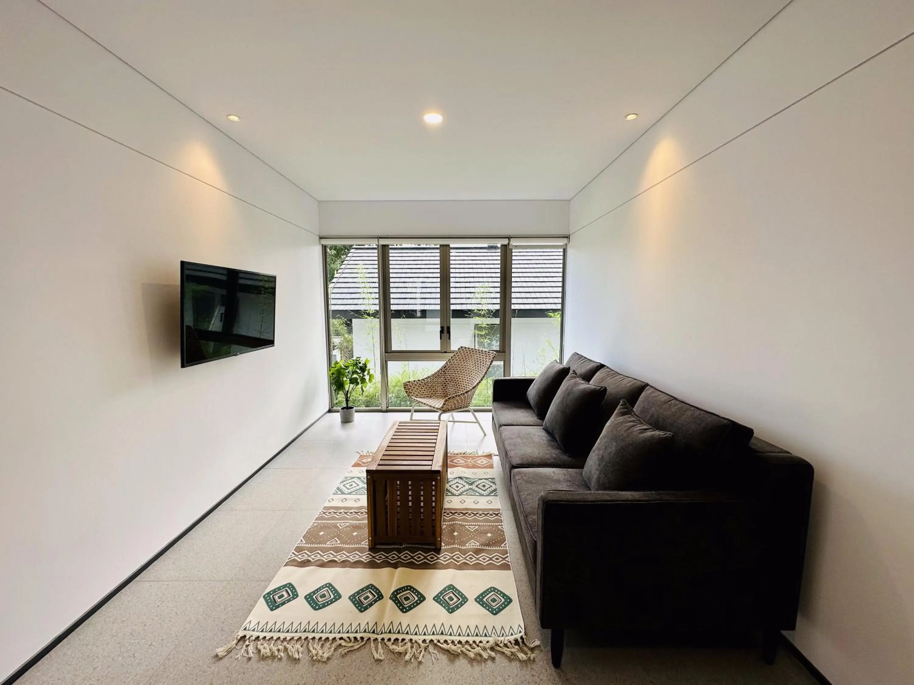Communal lounge/ TV room in Bungalow Homes