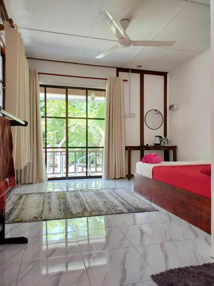 Bed in D'Impiana Riverview Chalet # Lenggong