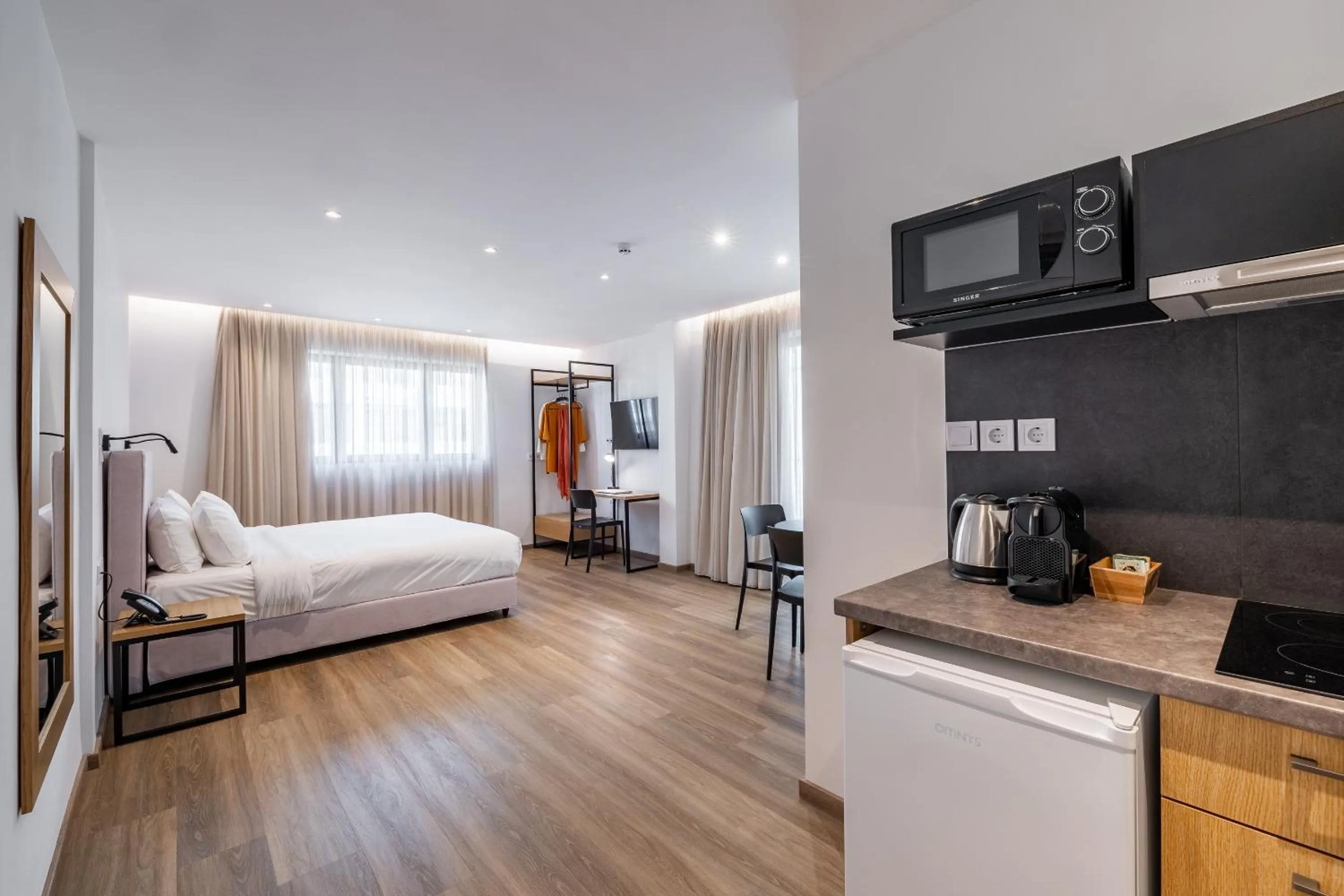 Bed in Pnoe Urban Living