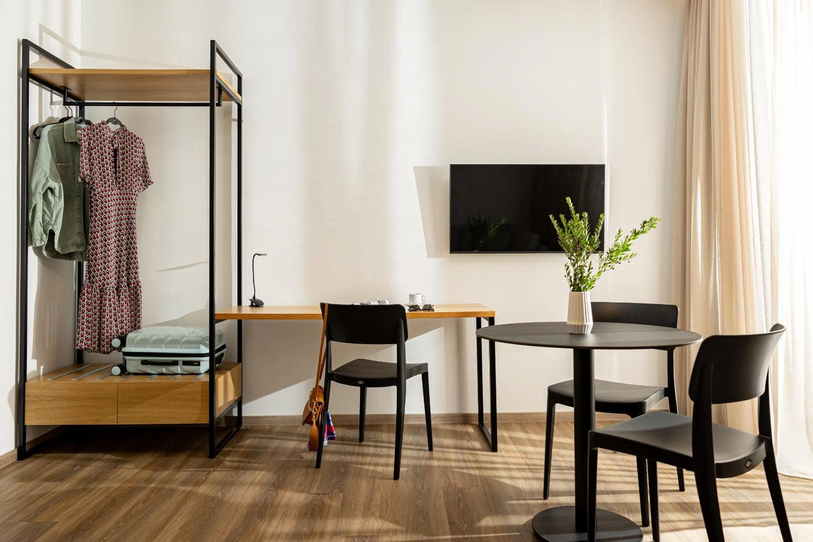 Seating area in Pnoe Urban Living