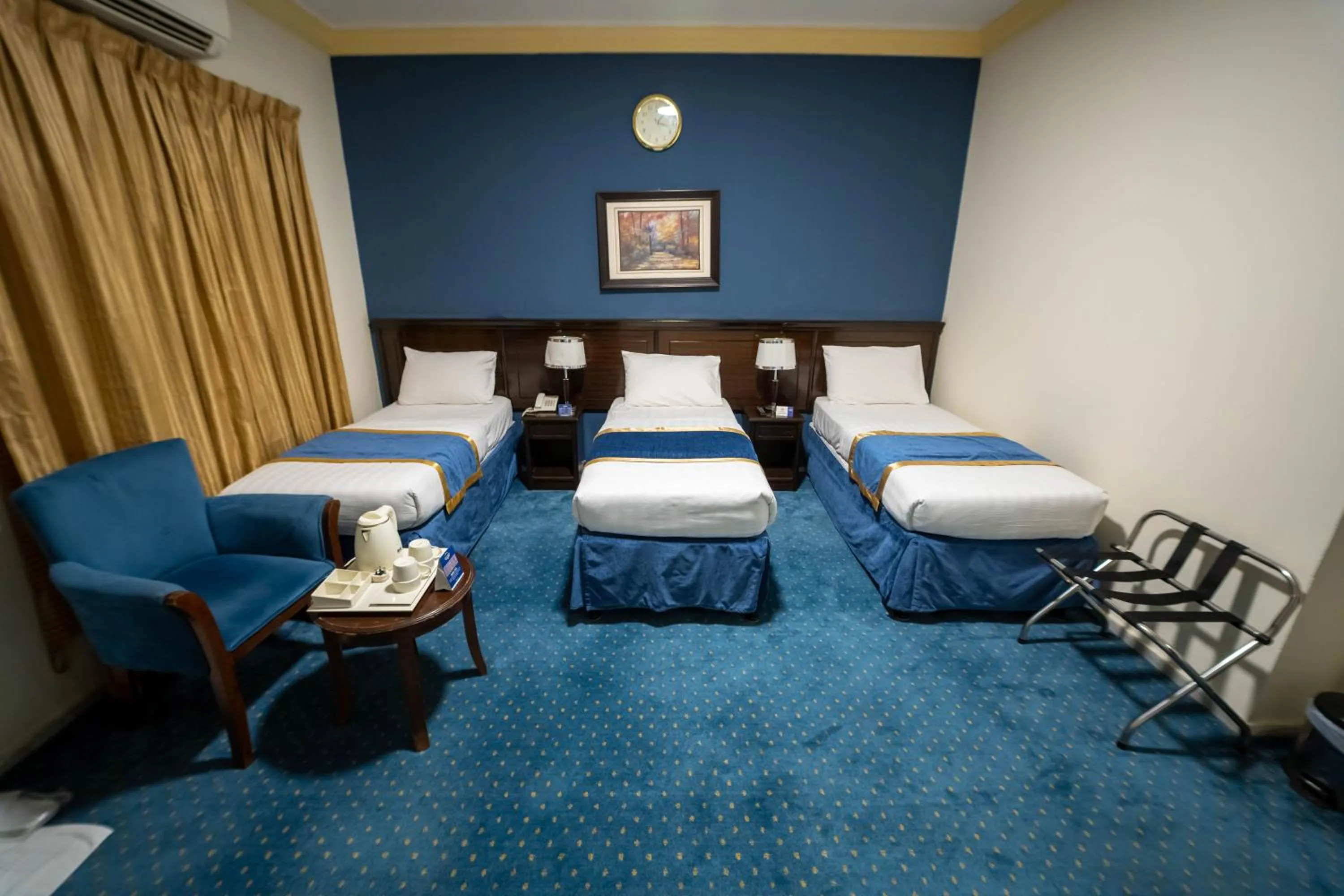 Bedroom in Al Barakah Mawaddah Hotel