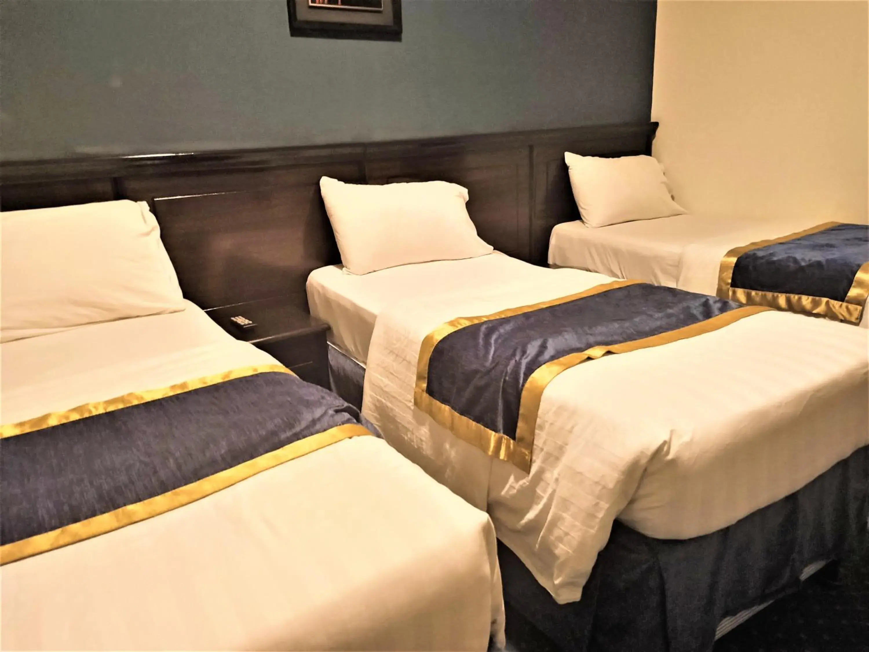 Triple Room with Private Bathroom in Al Barakah Mawaddah Hotel Triple Room with Private Bathroom in Al Barakah Mawaddah Hotel