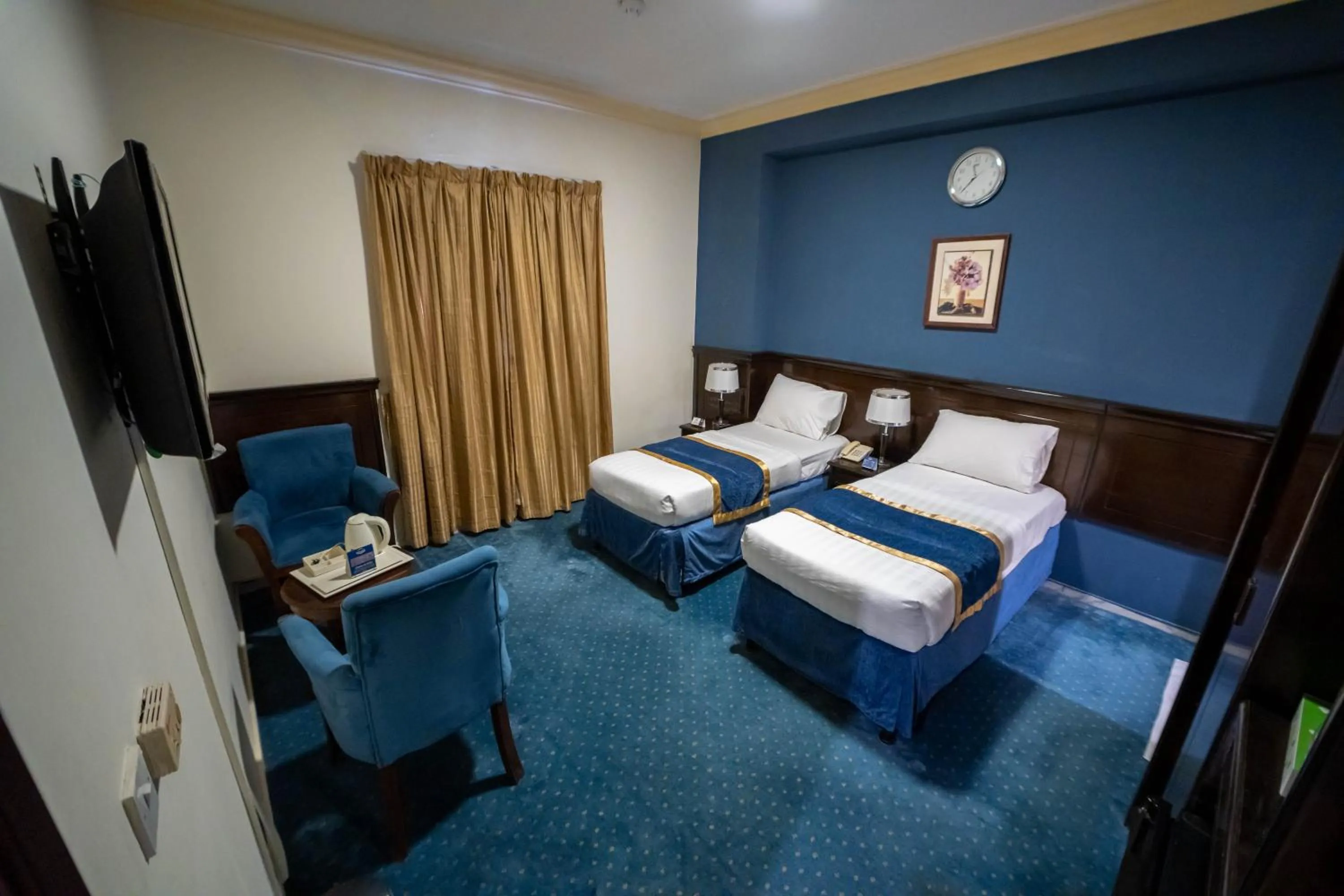 Bedroom in Al Barakah Mawaddah Hotel