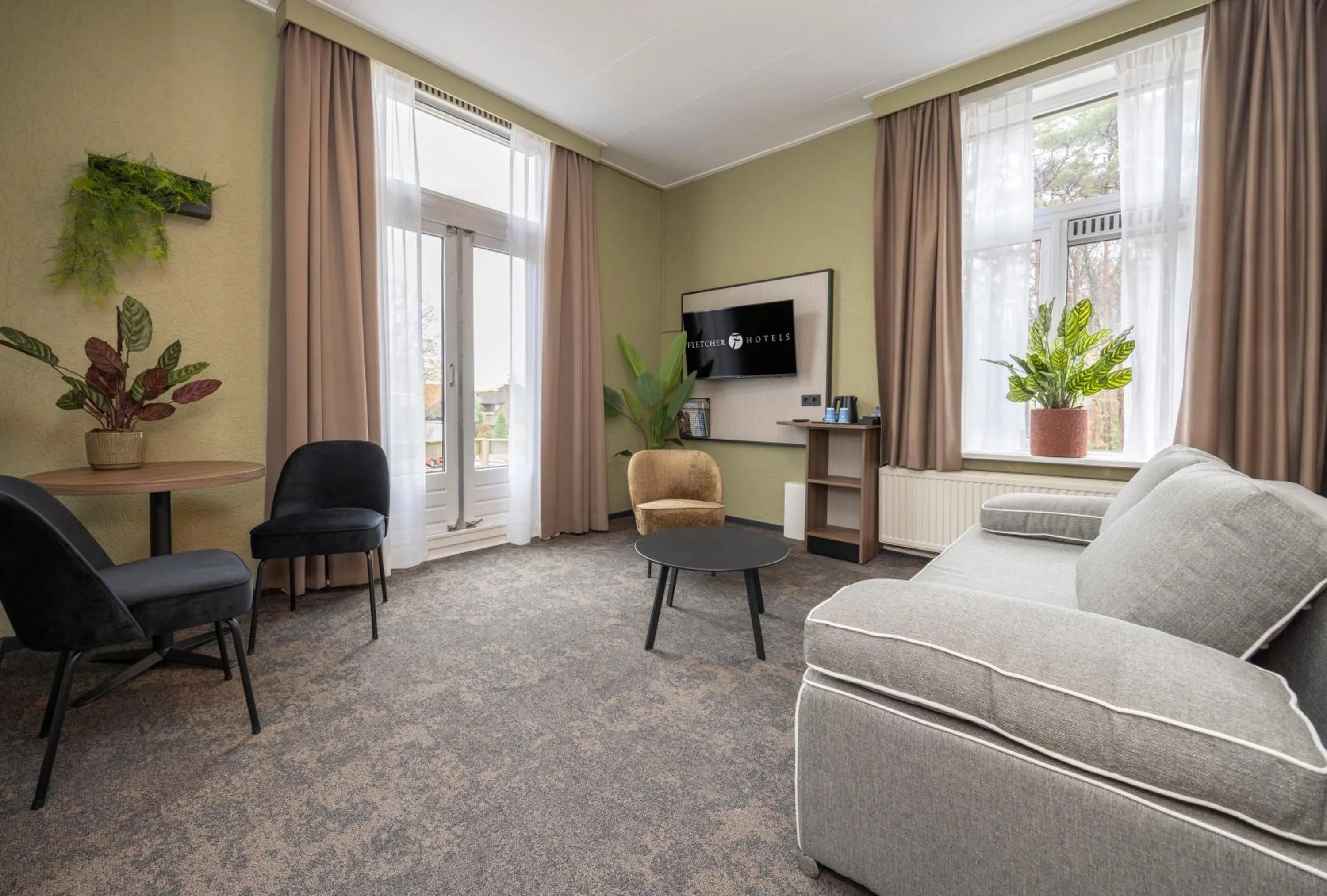 Living room in Fletcher Hotel Apeldoorn