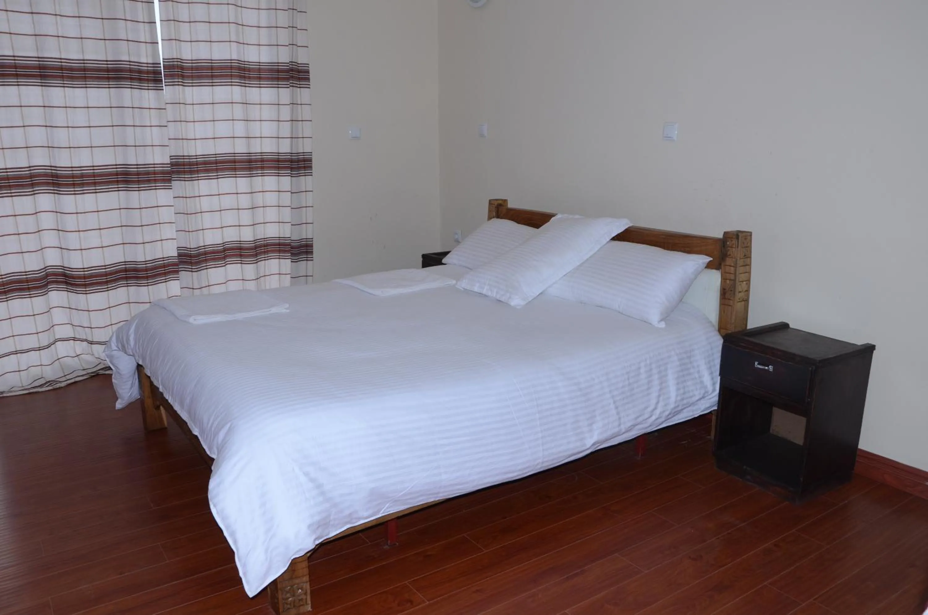 Bed in Zan-Seyoum Hotel - Lalibela