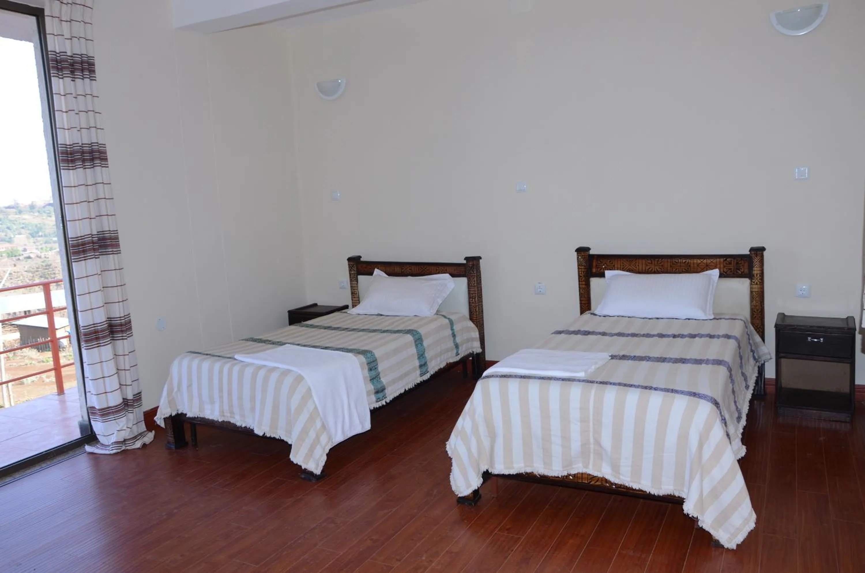 Landmark view, Bed in Zan-Seyoum Hotel - Lalibela