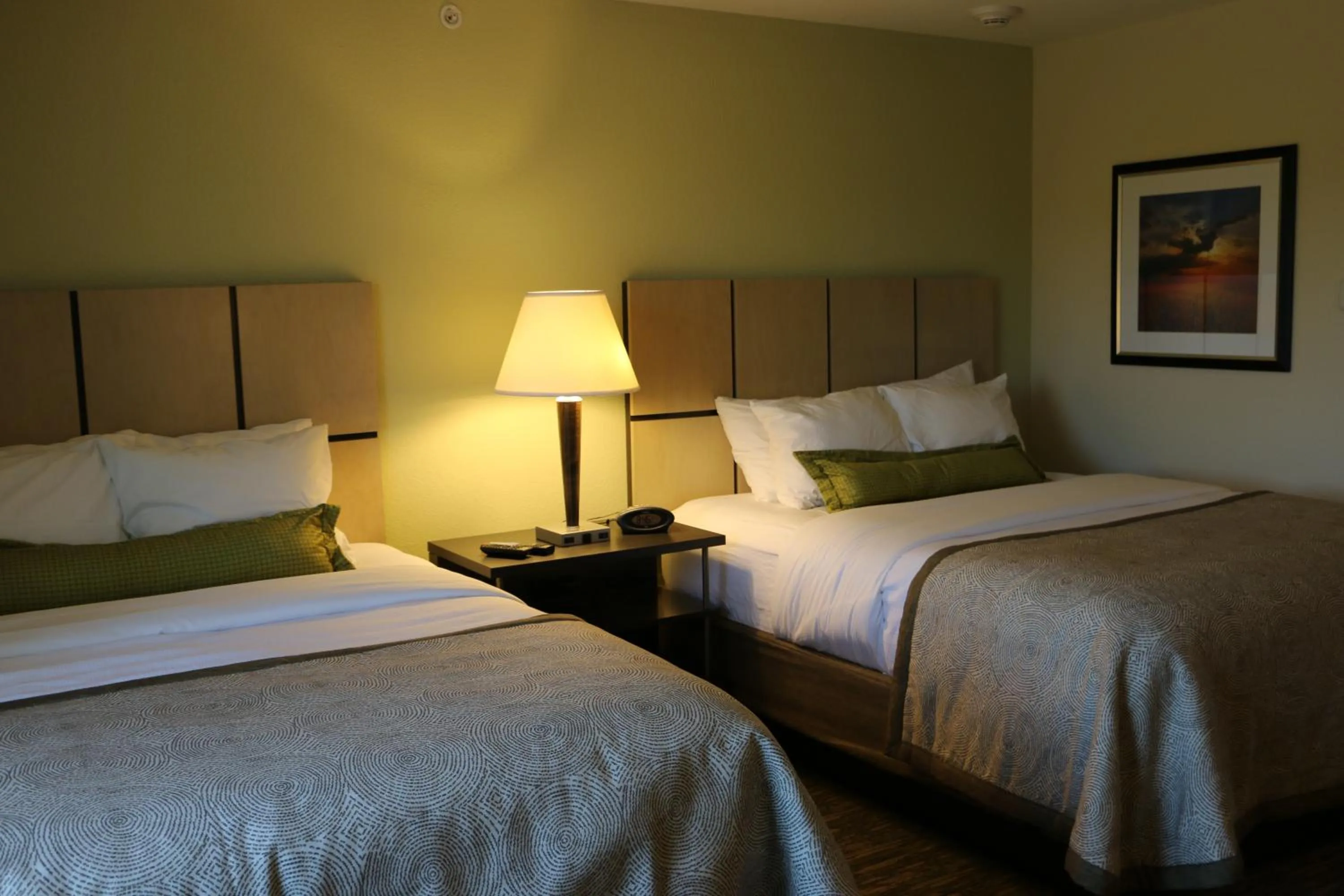 Bed in Candlewood Suites Bloomington by IHG
