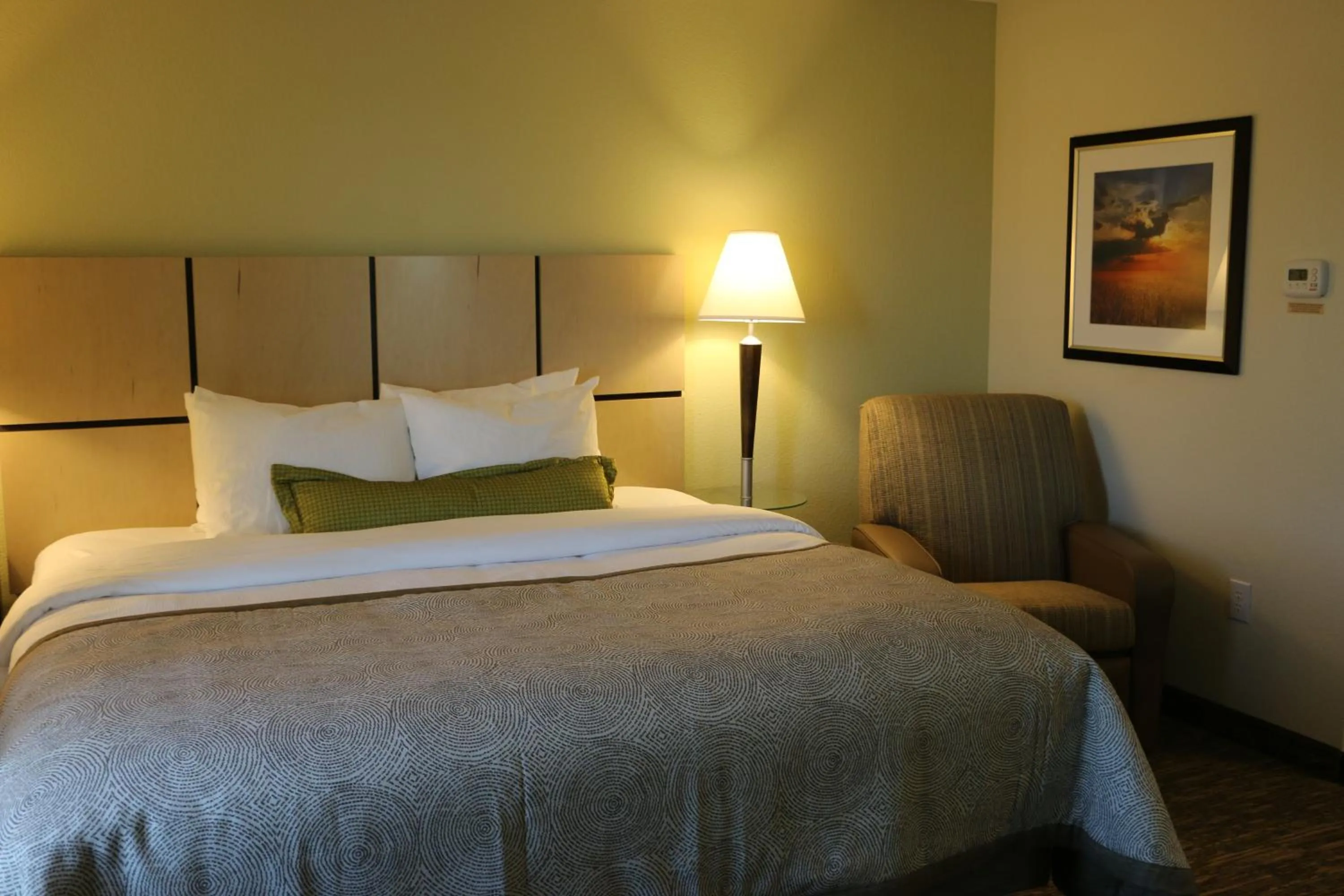 Bed in Candlewood Suites Bloomington by IHG