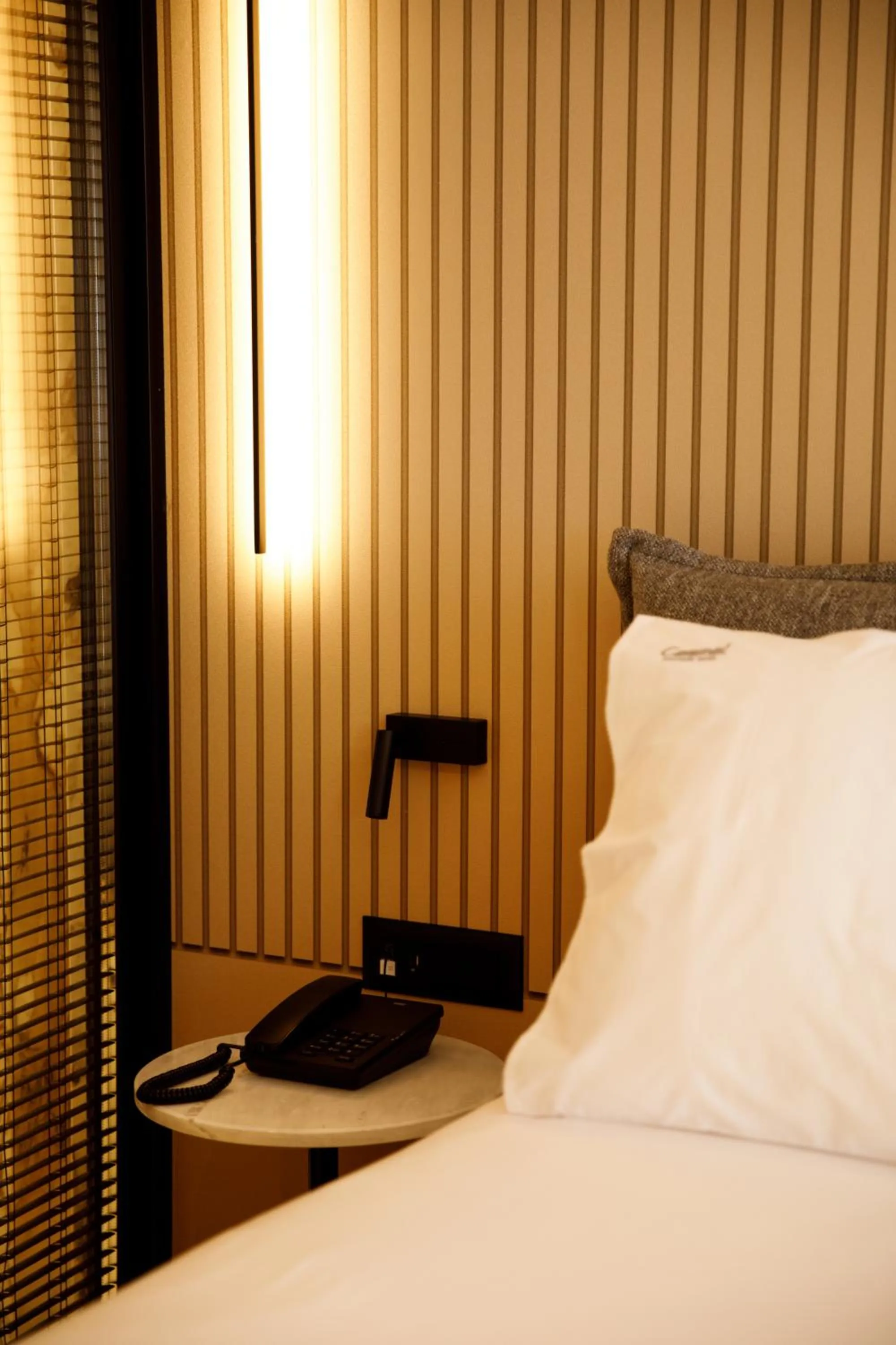 Decorative detail, Bed in Caramel Boutique Hotel