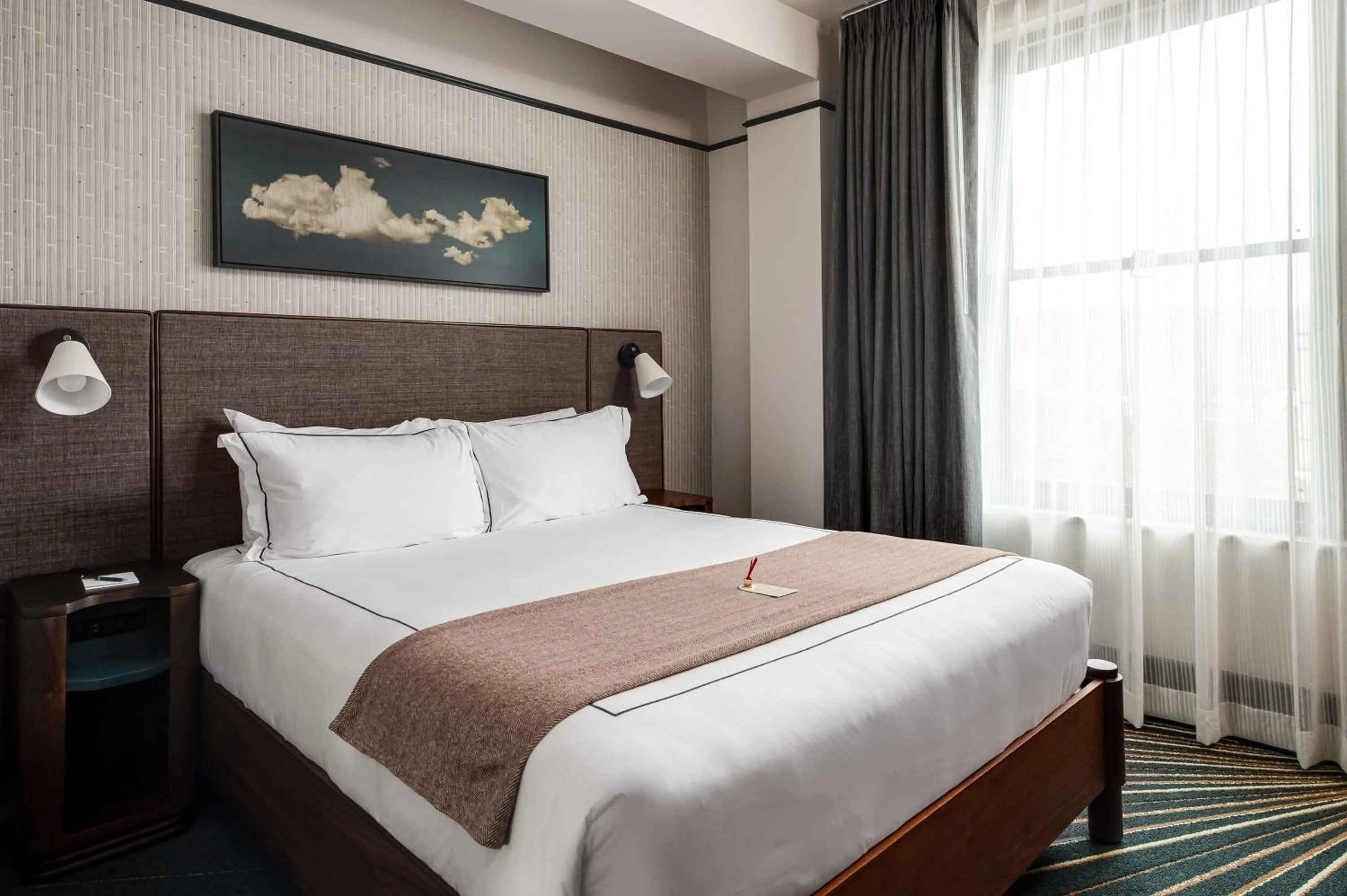 Bed in The Flat Iron Hotel