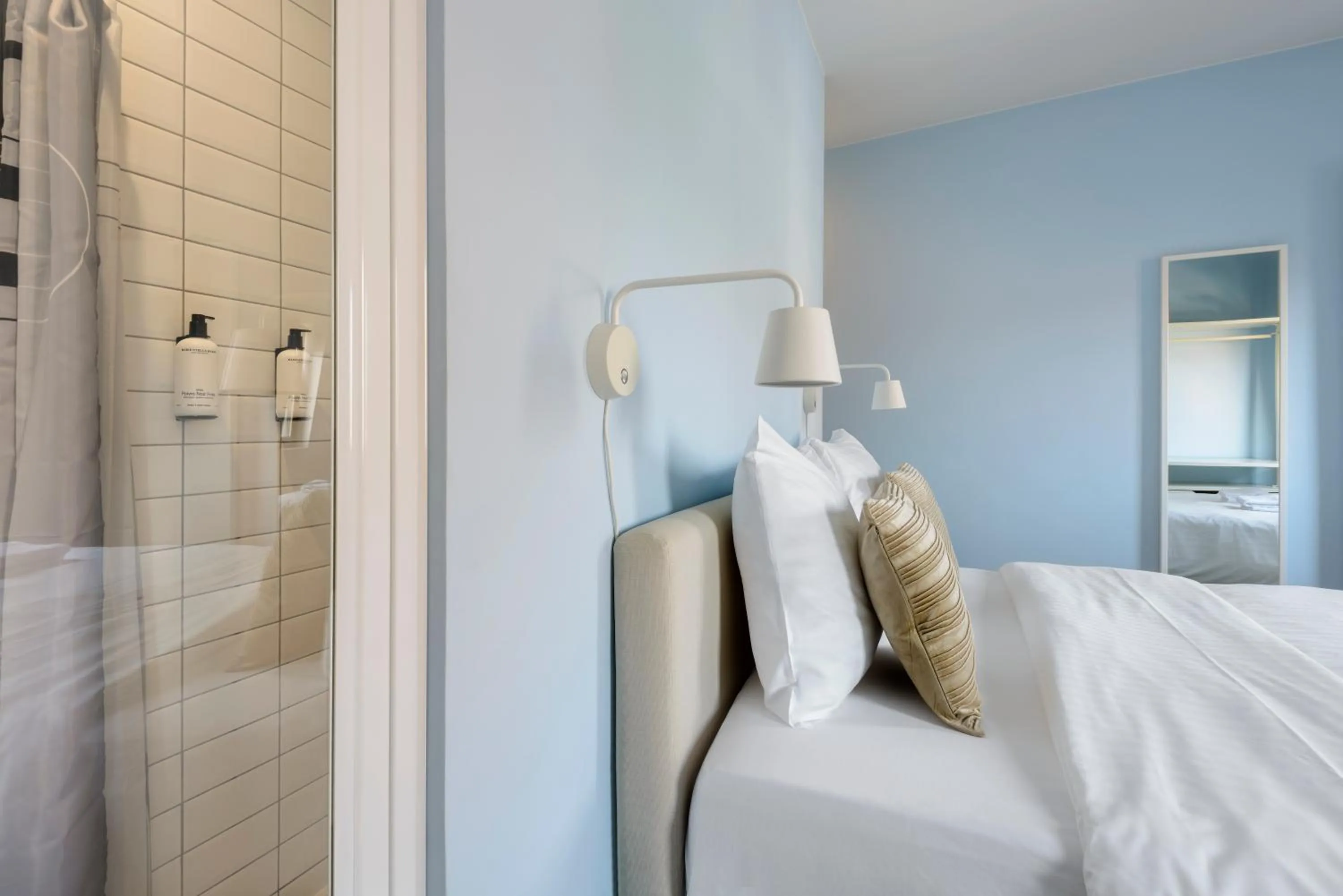 Bed in R73 Apartments by Domani Hotels