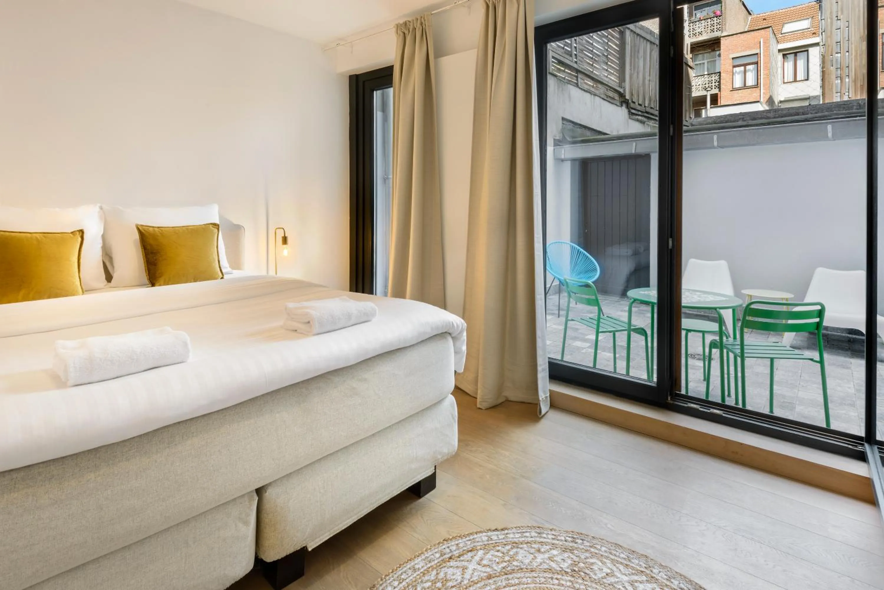 Bed in R73 Apartments by Domani Hotels