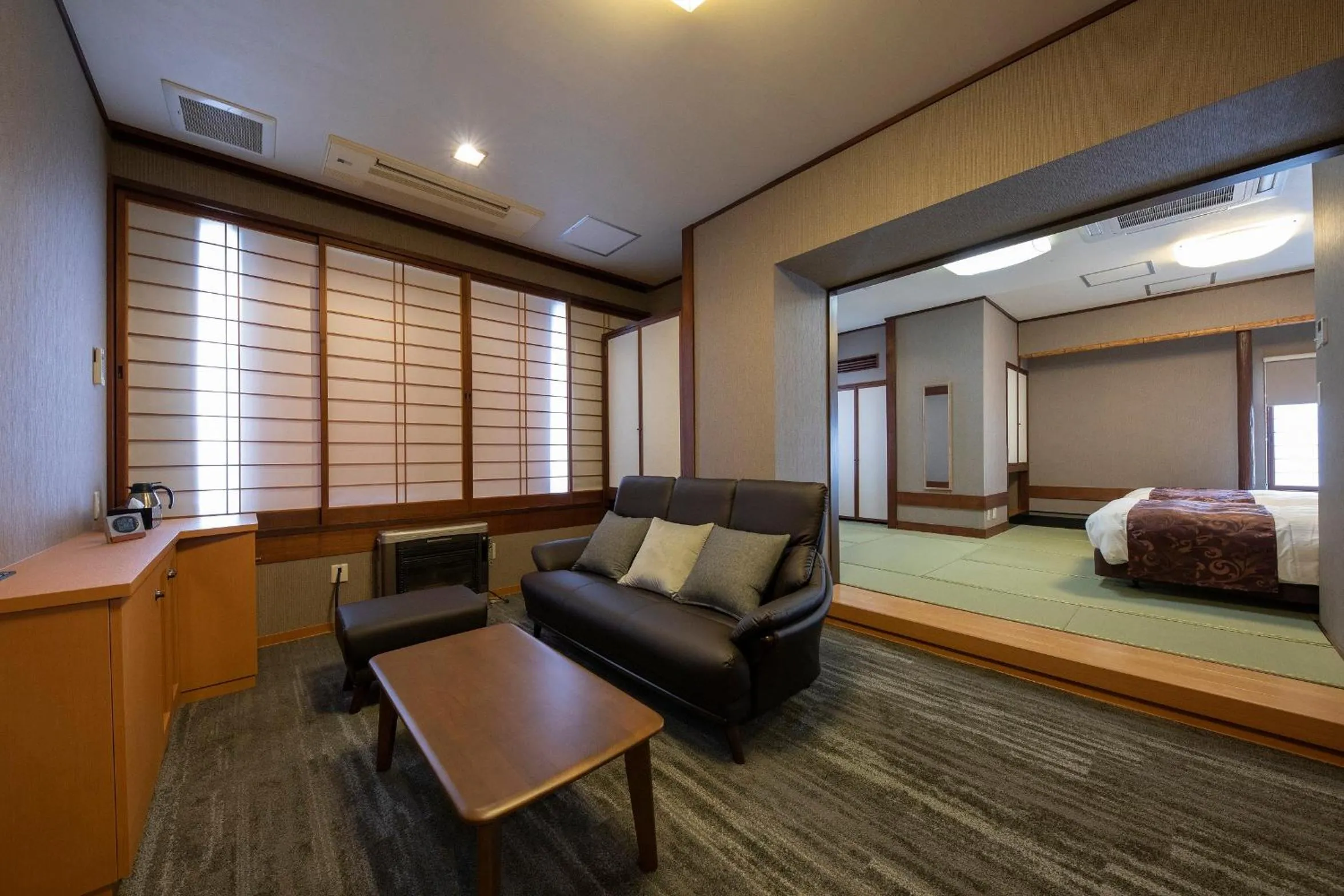 Living room, Bed in Hotel Apple Land