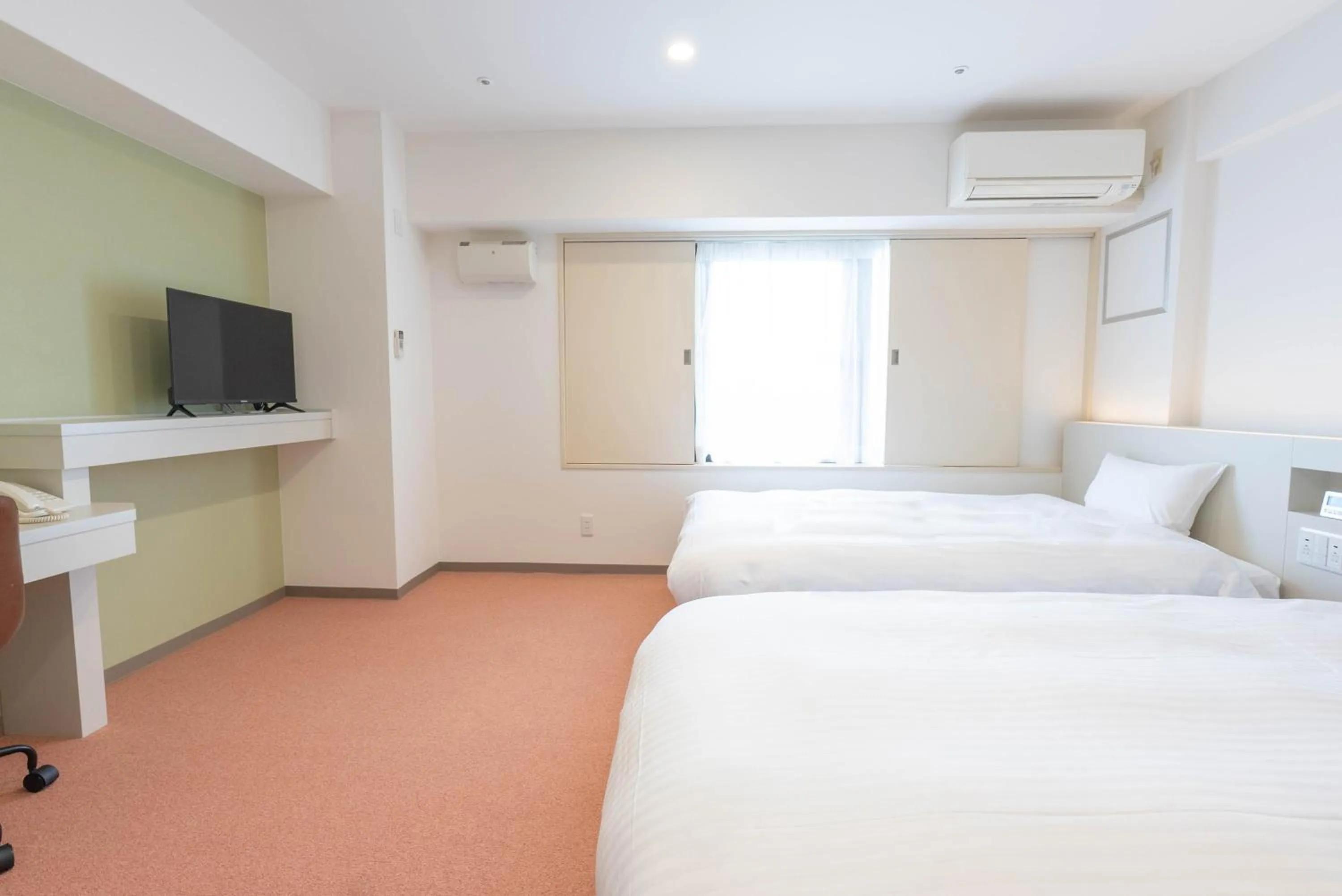 Bed in Hotel Alpha Inn Akita