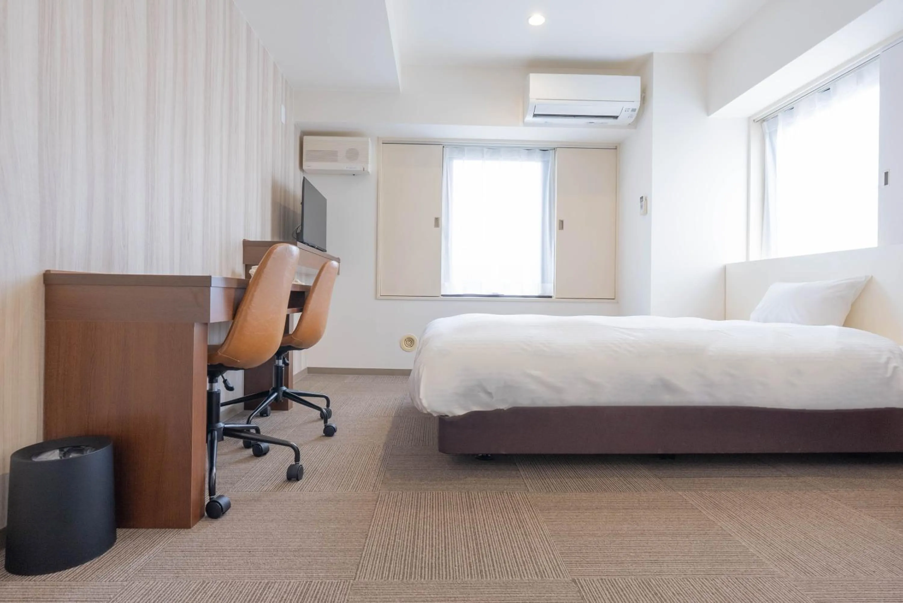 Bed in Hotel Alpha Inn Akita