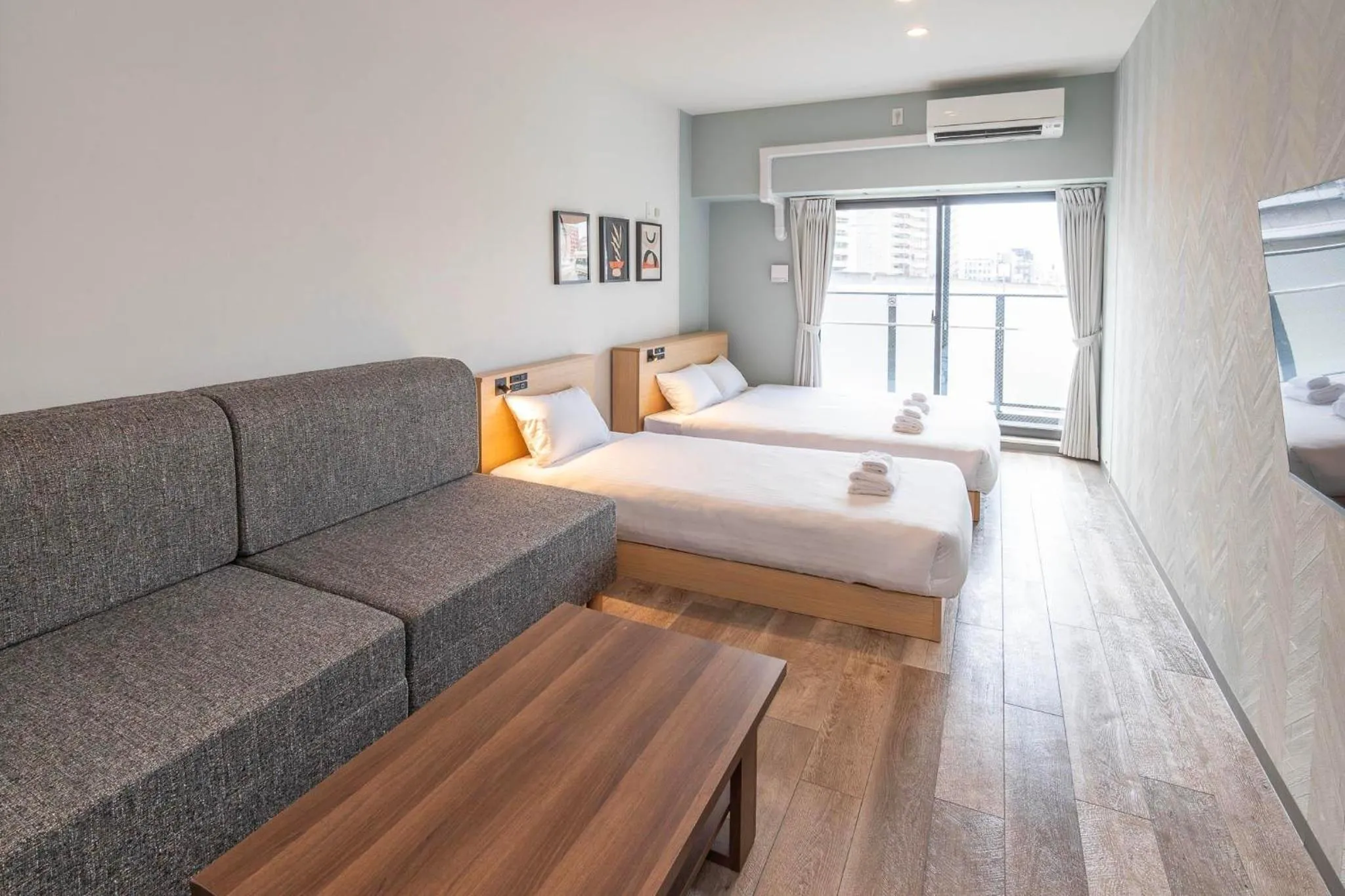 Photo of the whole room, Bed in WELLSTAY Osaka Shinimamiya Station