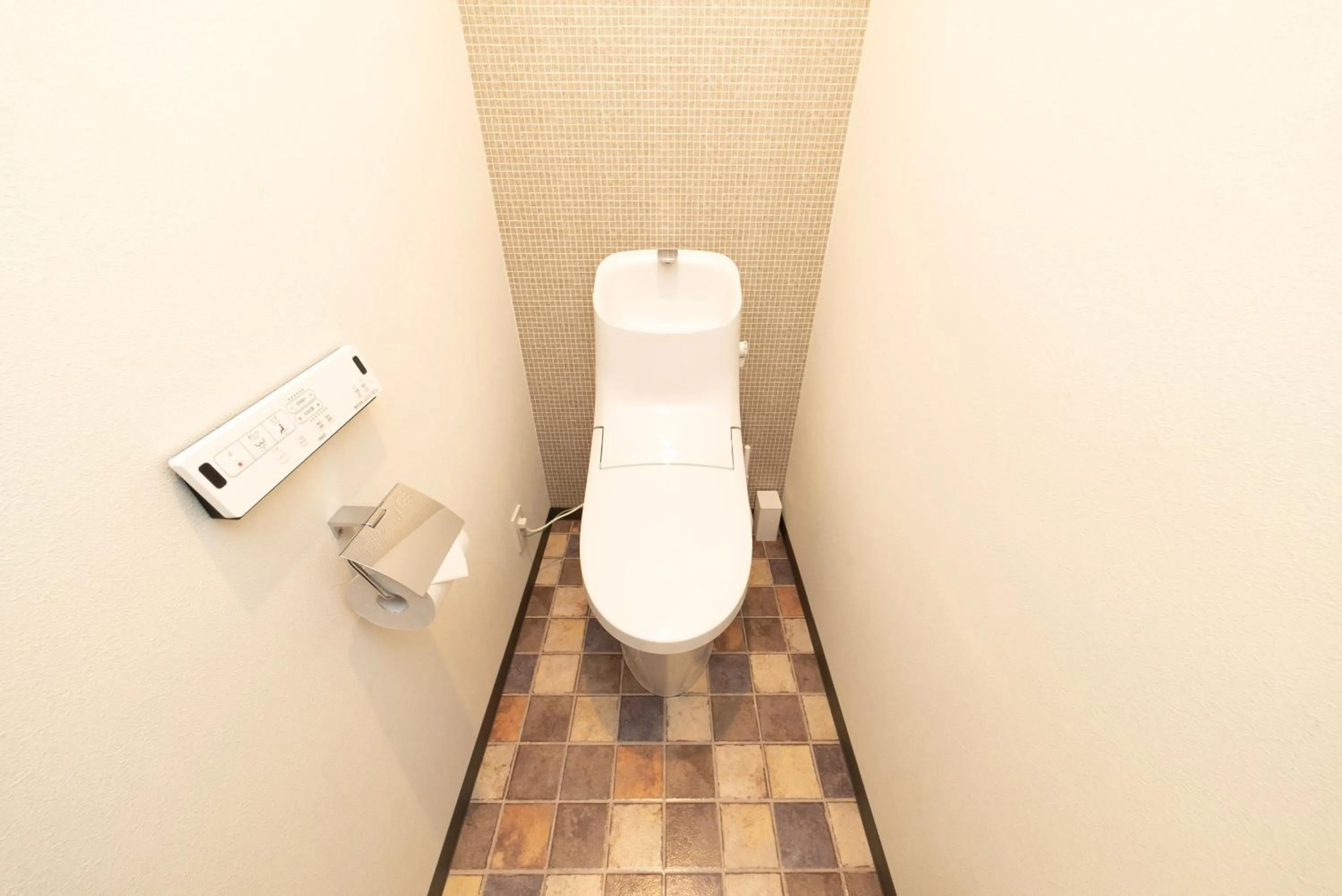 Toilet in WELLSTAY Osaka Shinimamiya Station