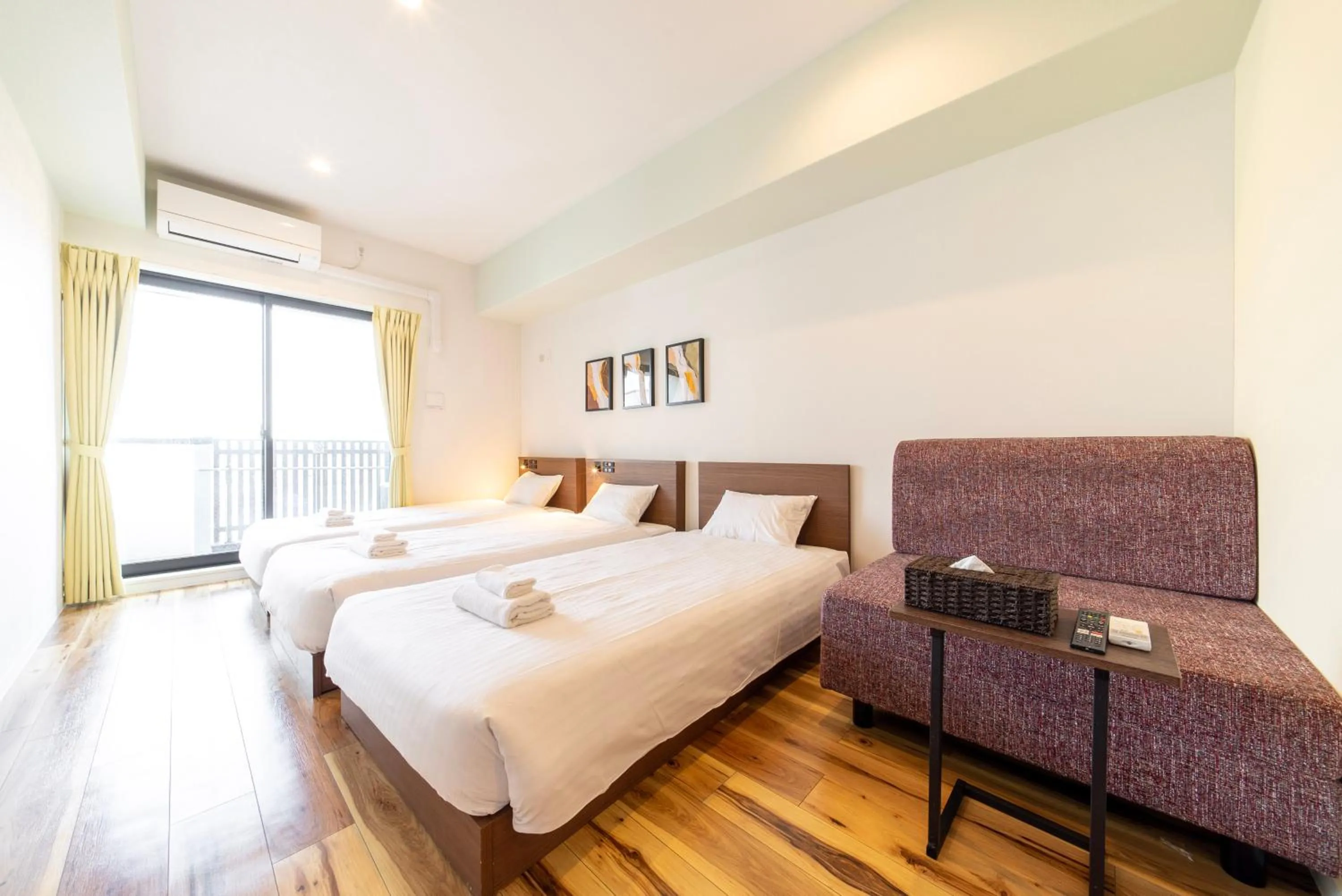 Photo of the whole room, Bed in WELLSTAY Osaka Shinimamiya Station