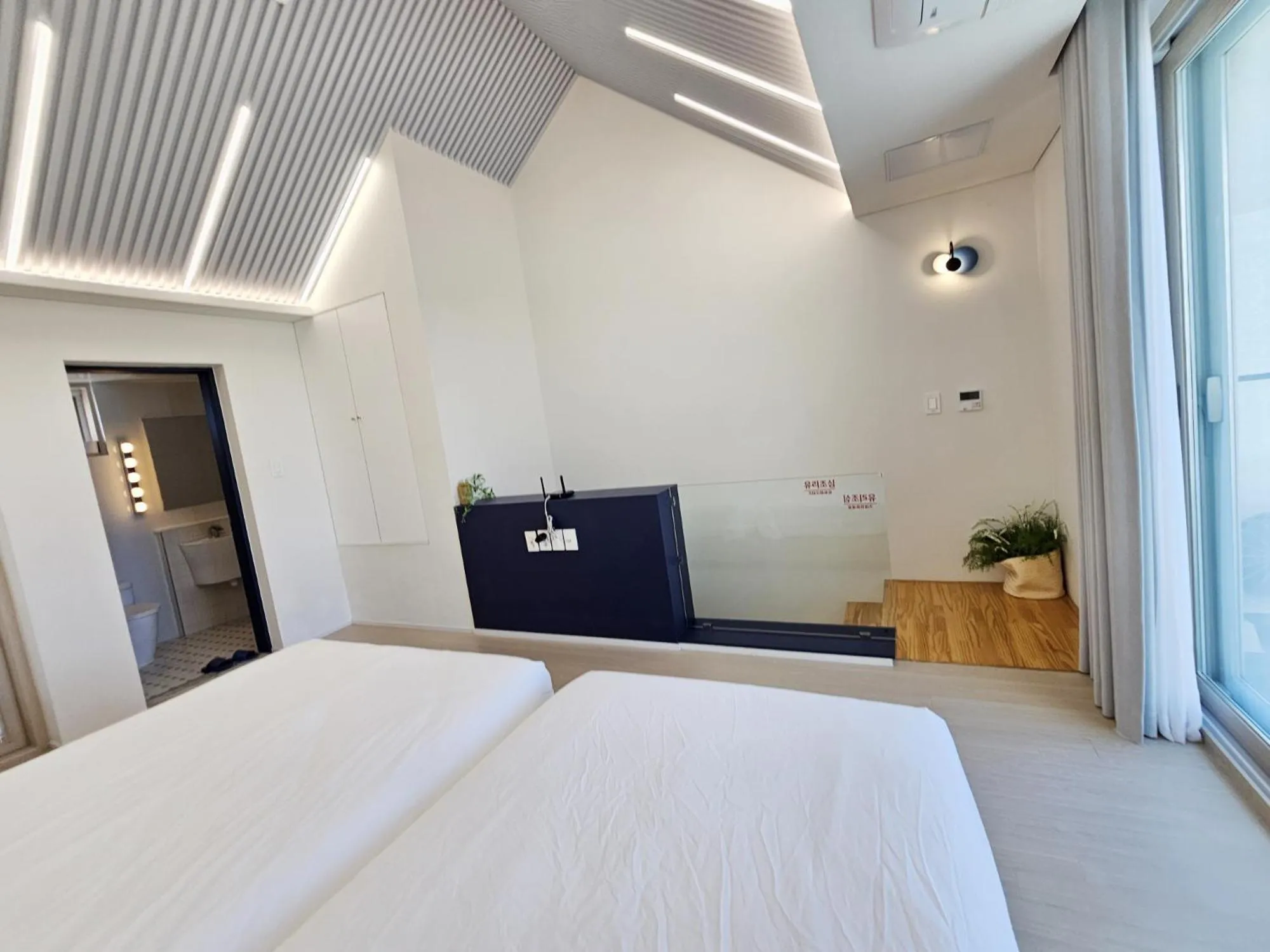 Bed in Jeju Badayeon Villa