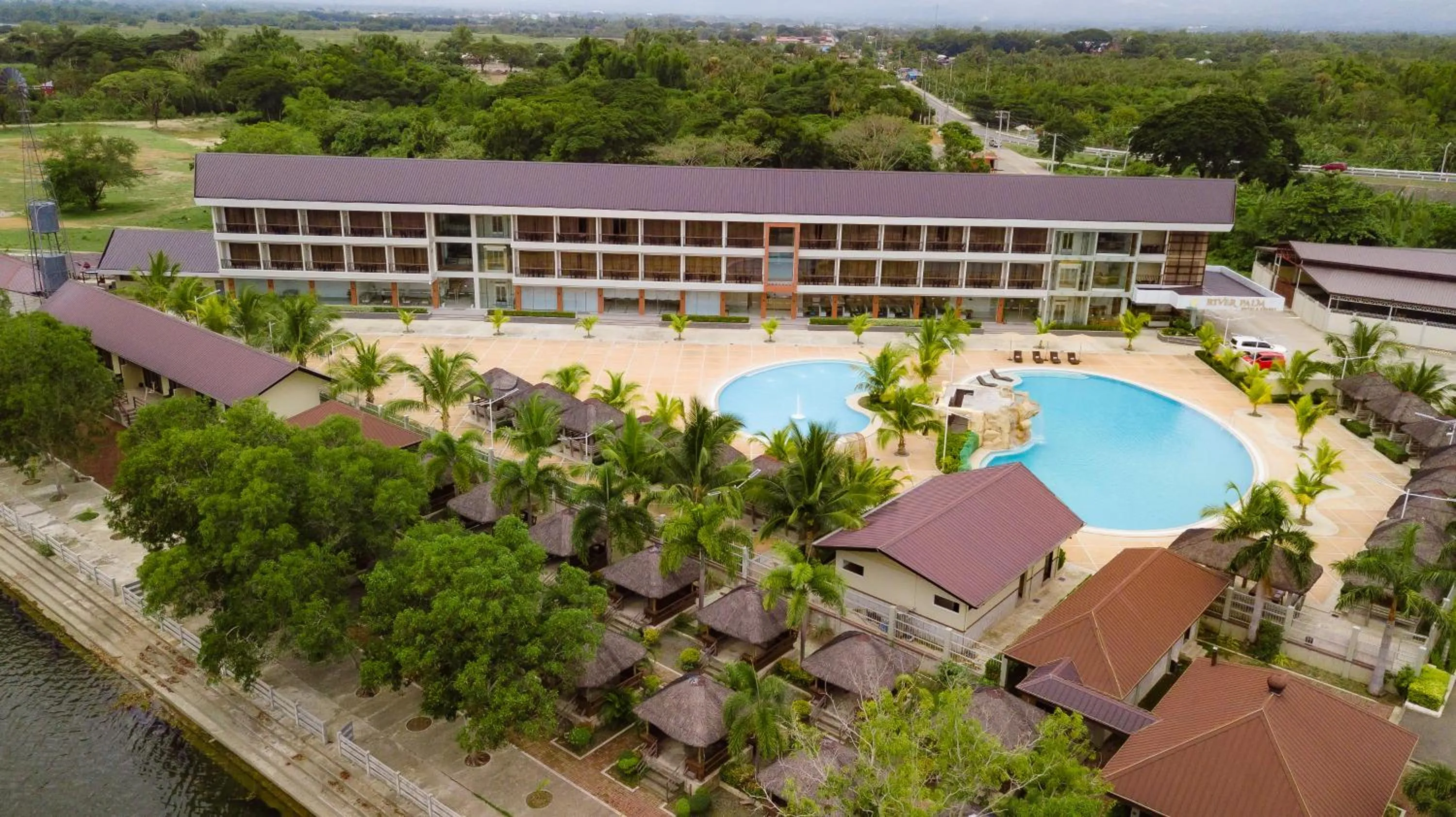 Property building in River Palm Hotel and Resort powered by Cocotel