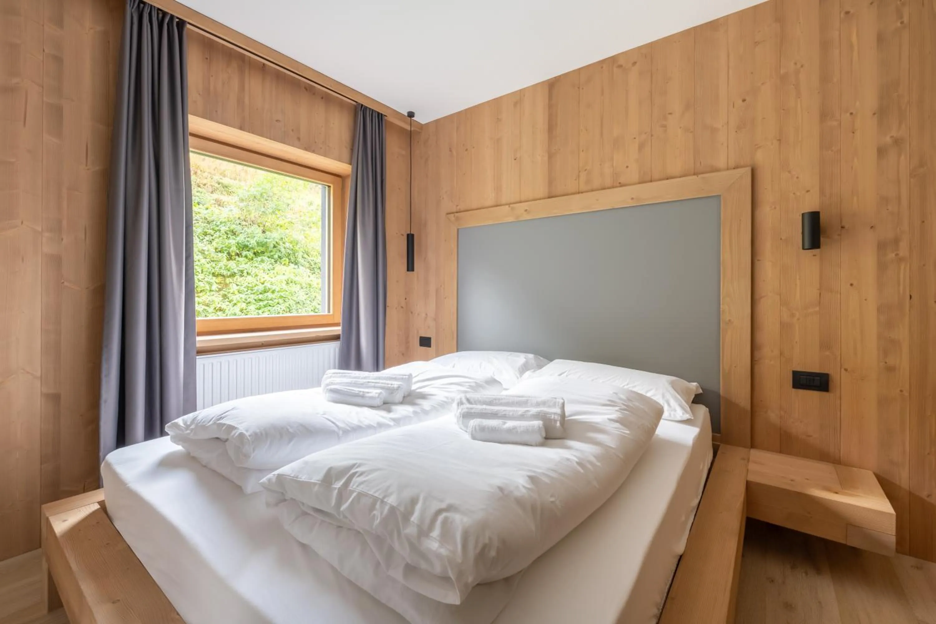 Bed in Ama Dolomiti - Residence