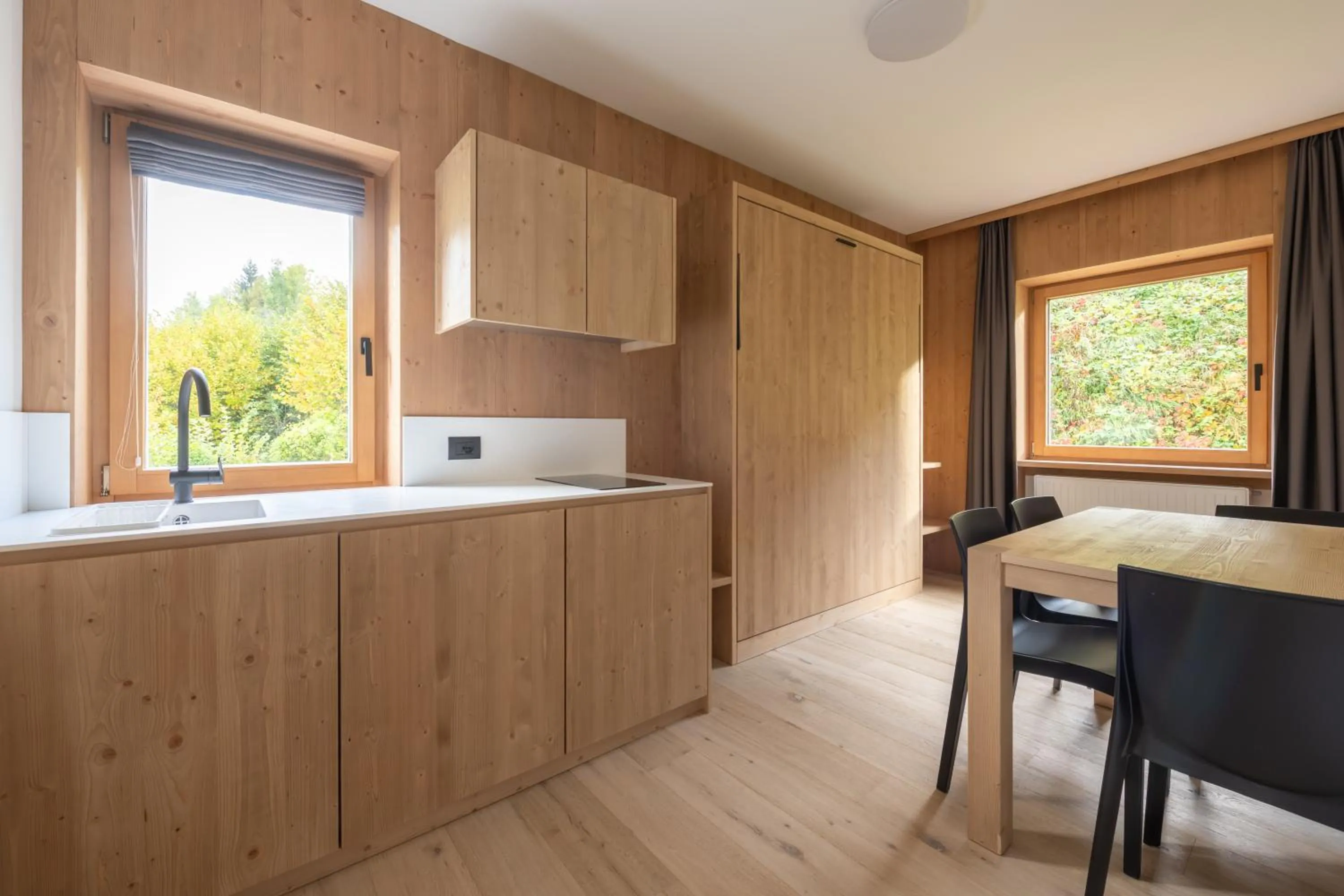 Kitchen or kitchenette in Ama Dolomiti - Residence