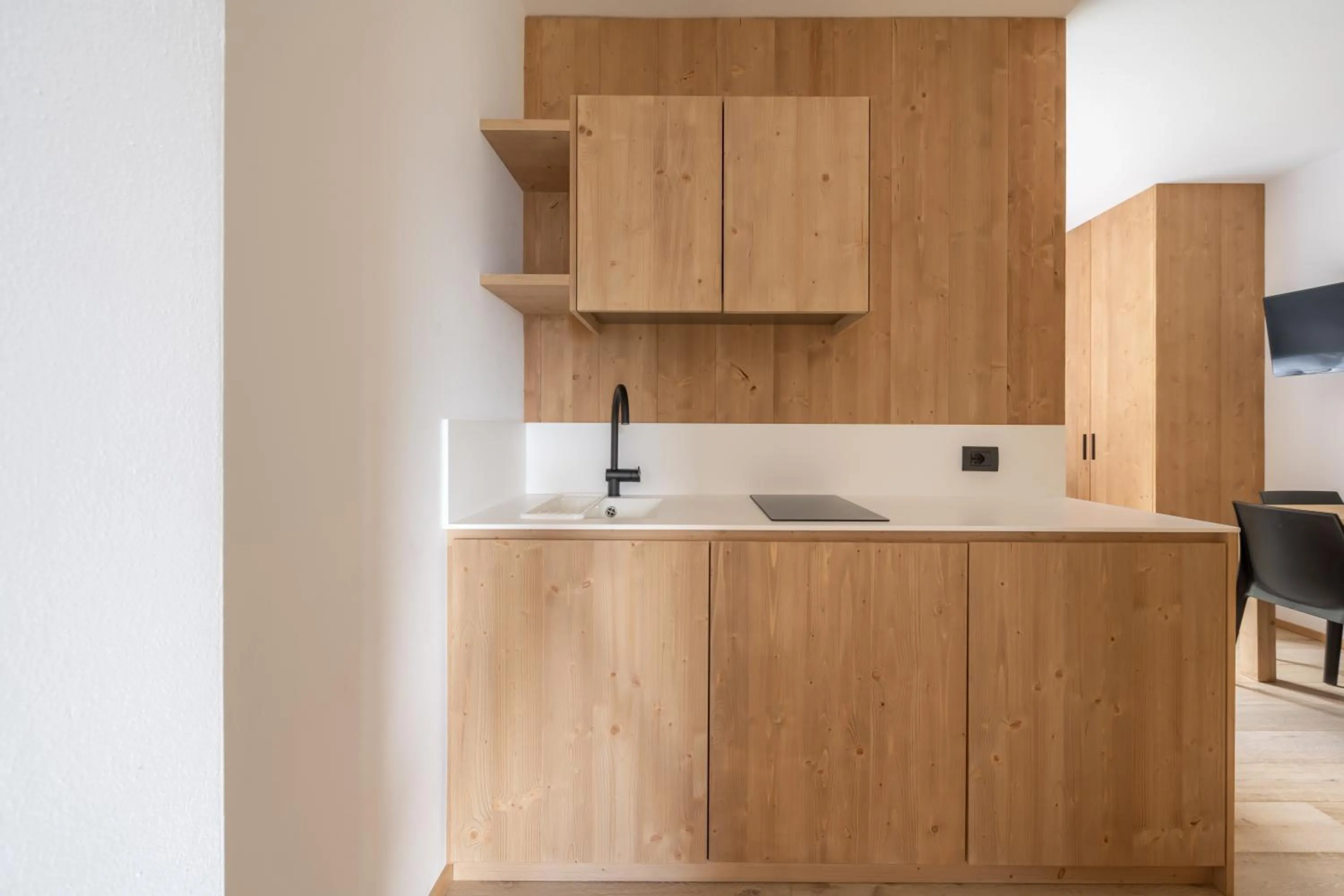 Kitchen or kitchenette in Ama Dolomiti - Residence