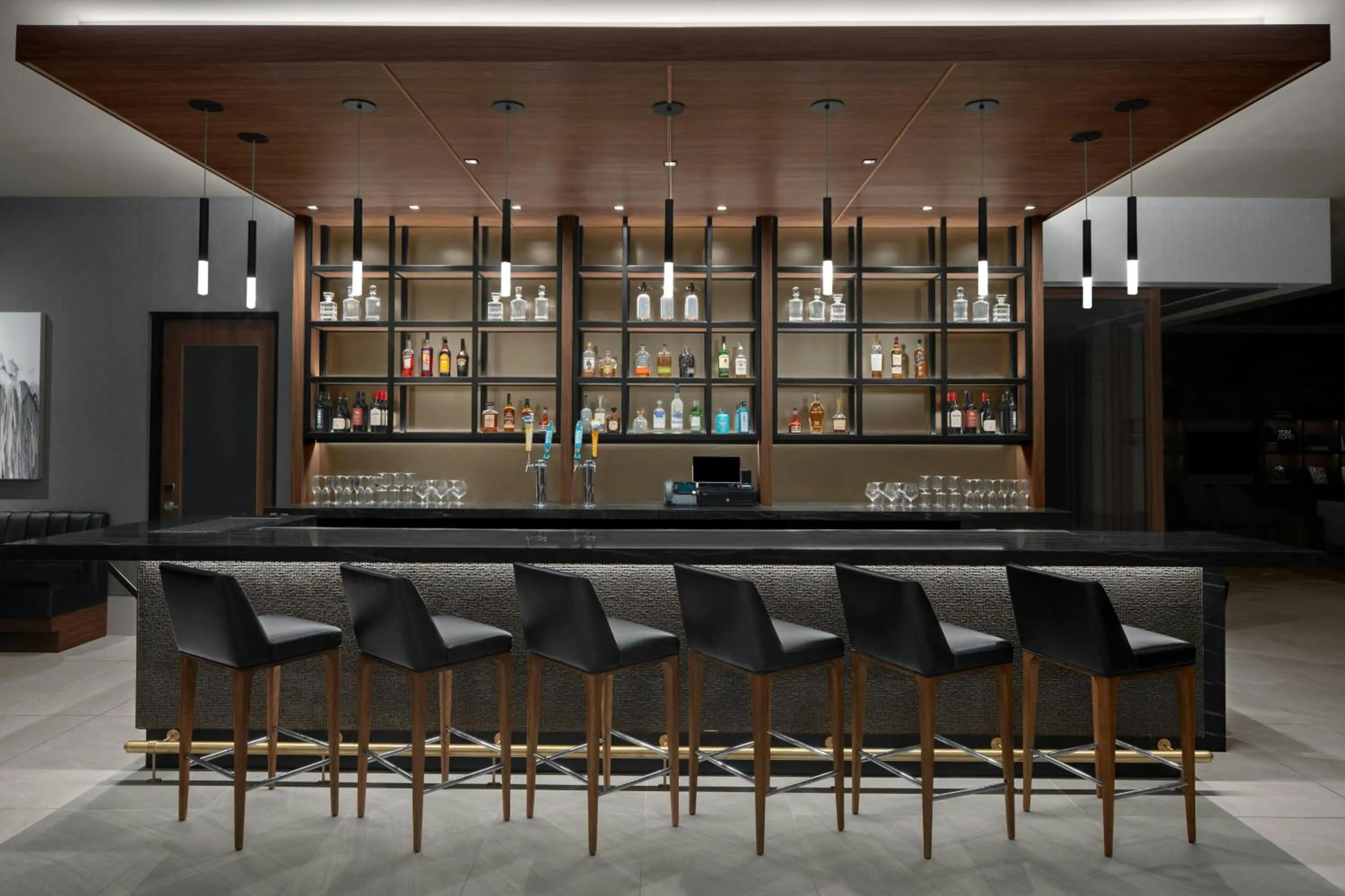 Lounge or bar in AC Hotel by Marriott Lansing University Area