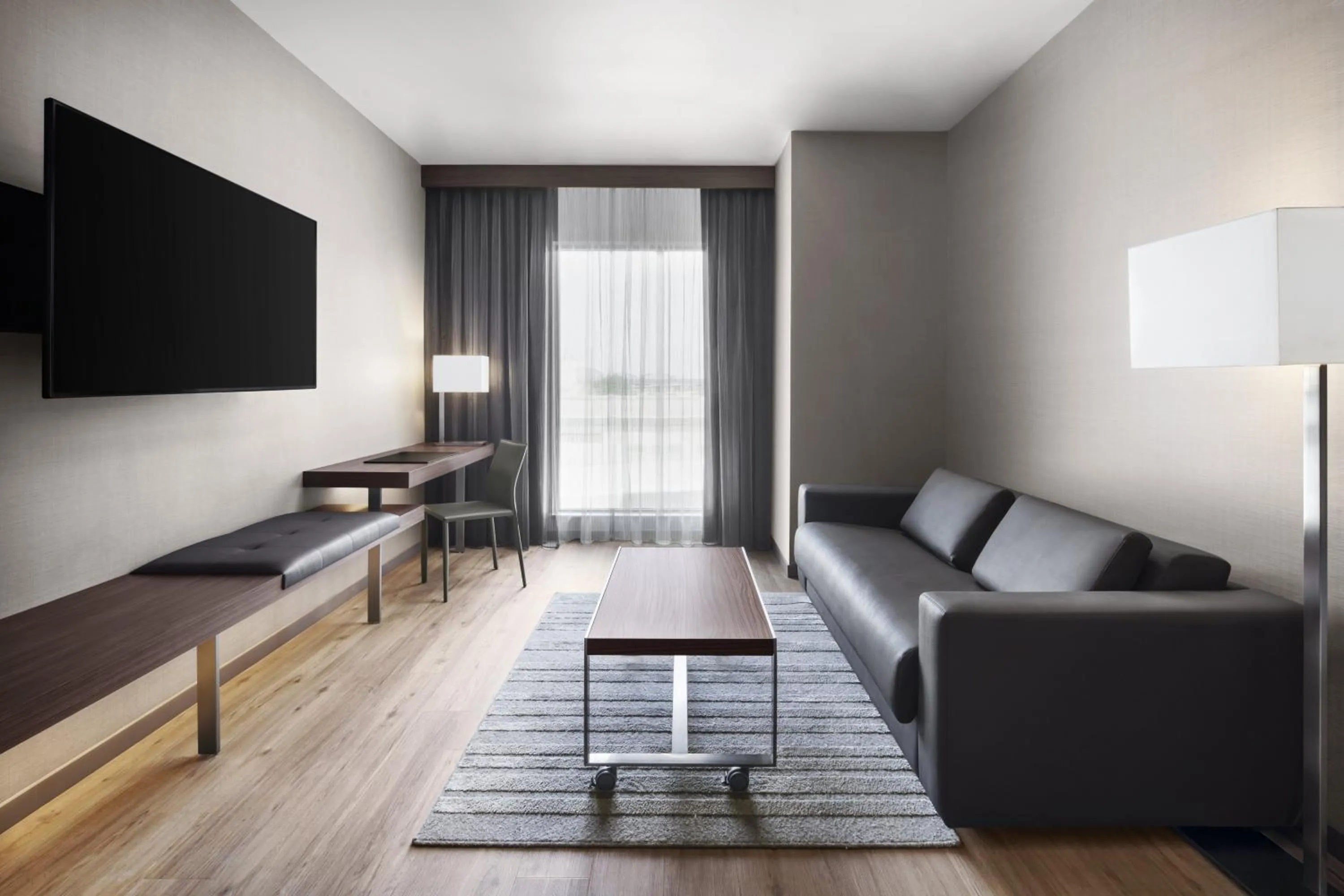 Living room in AC Hotel by Marriott Lansing University Area