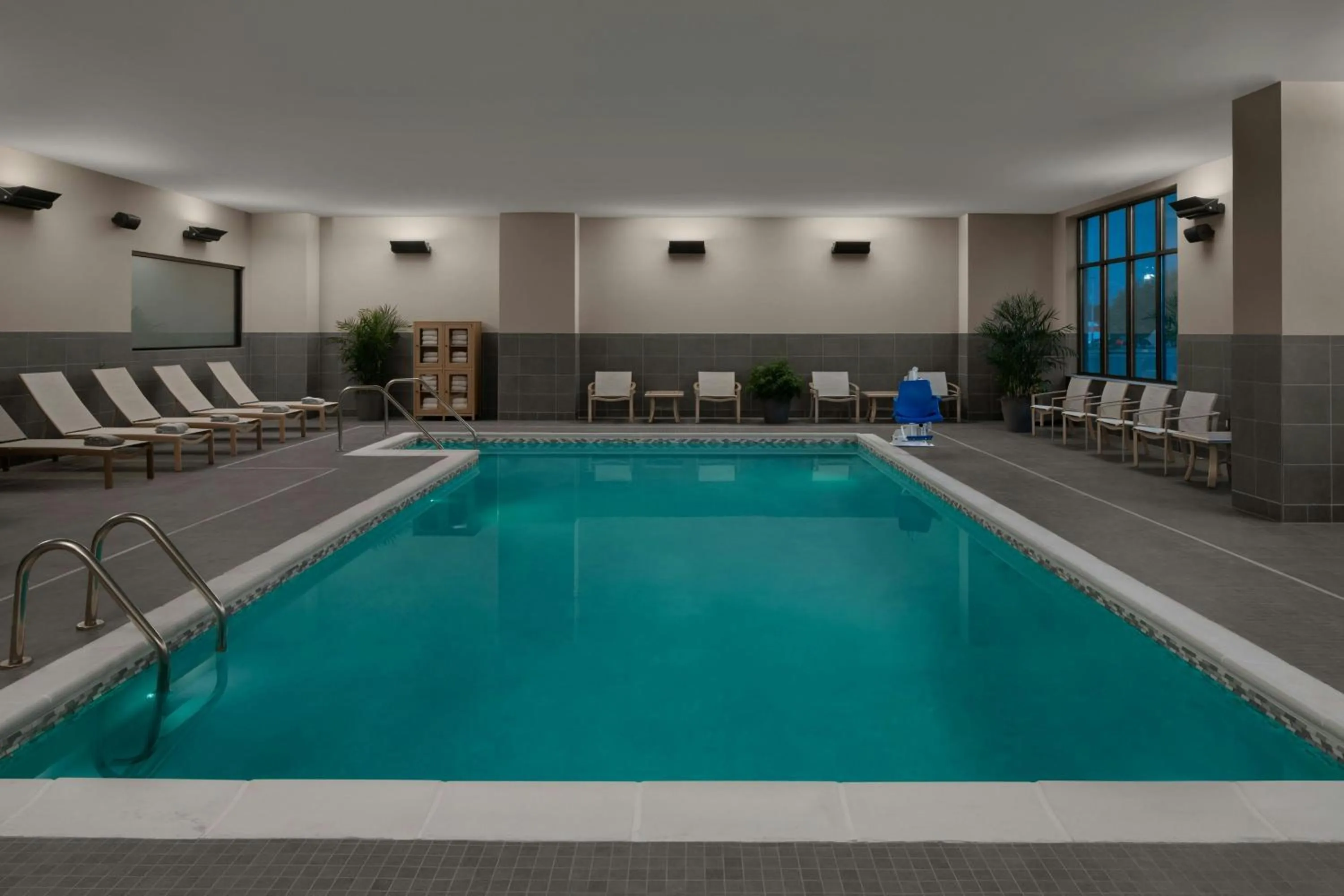Swimming pool in AC Hotel by Marriott Lansing University Area