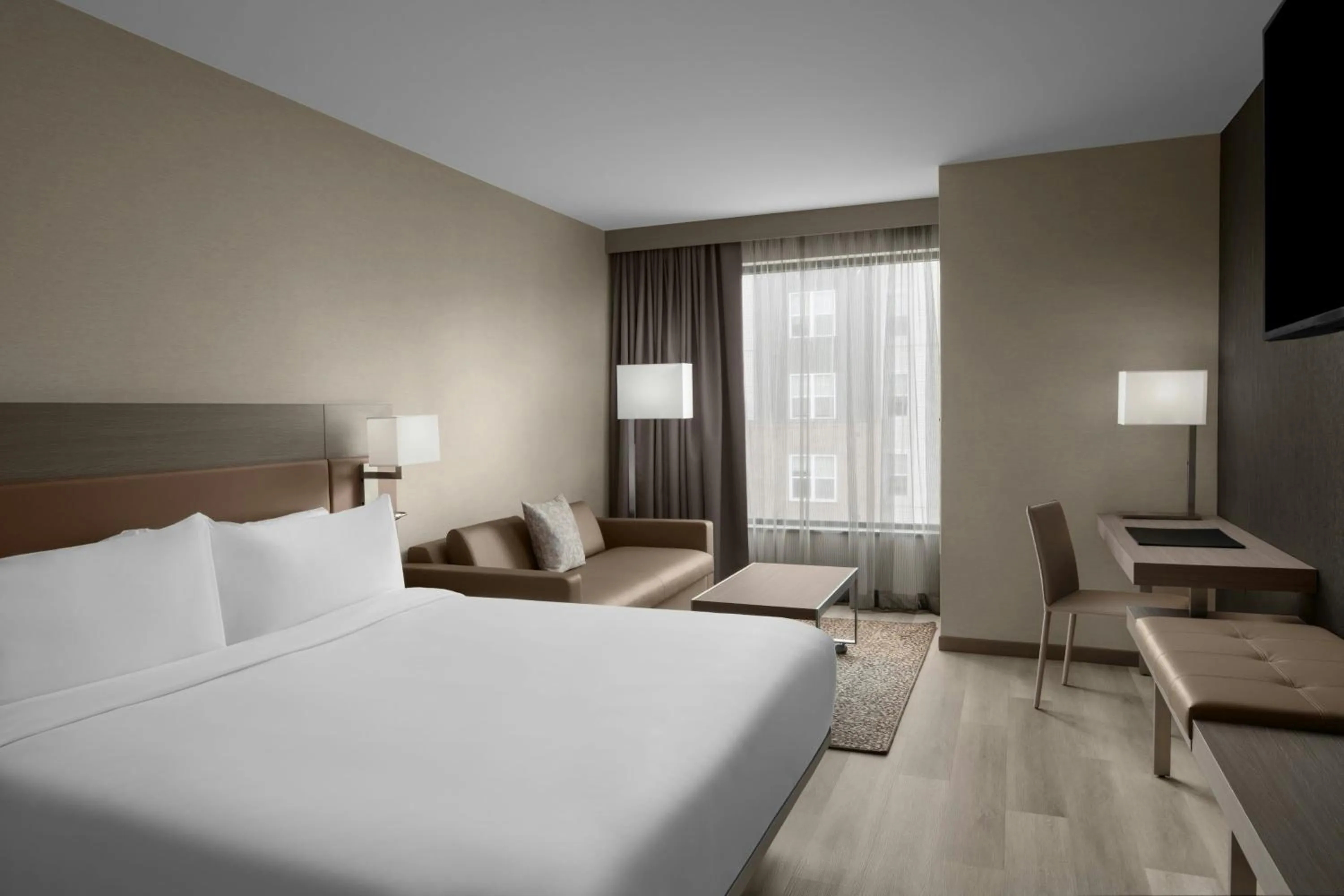 Photo of the whole room, Bed in AC Hotel by Marriott Lansing University Area