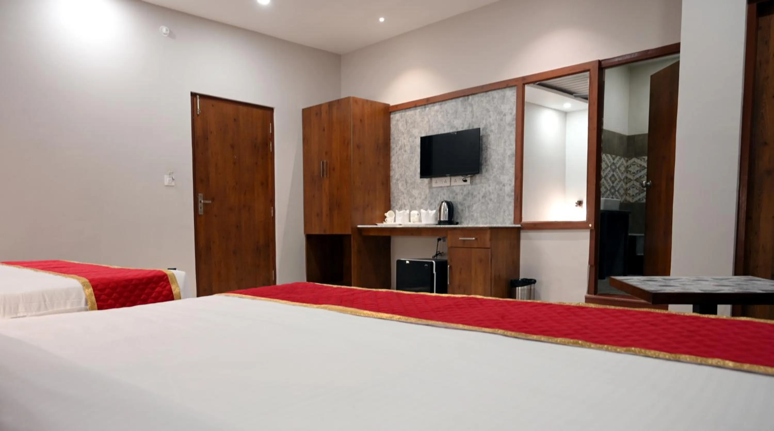 Bed in Hotel Singla Residency