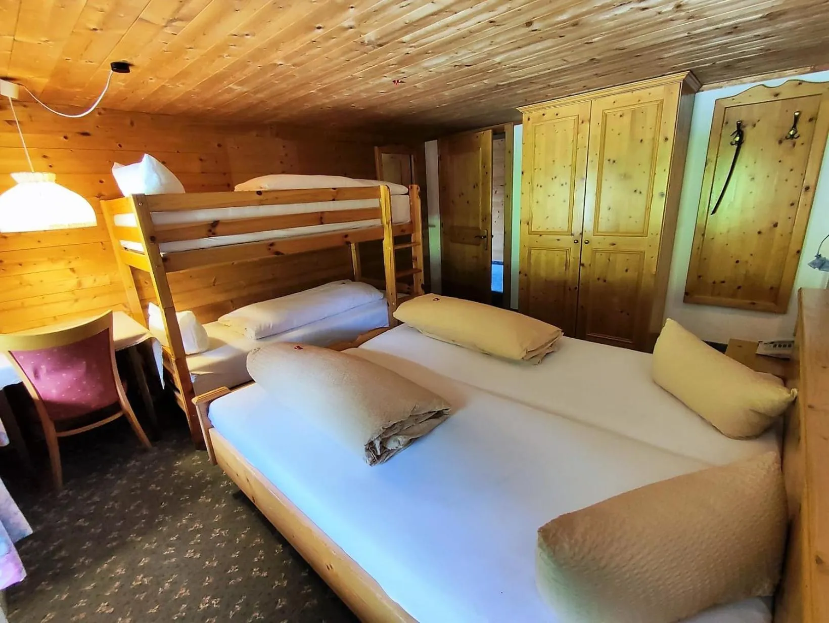 Photo of the whole room, Bed in Gasthaus Mitterjager