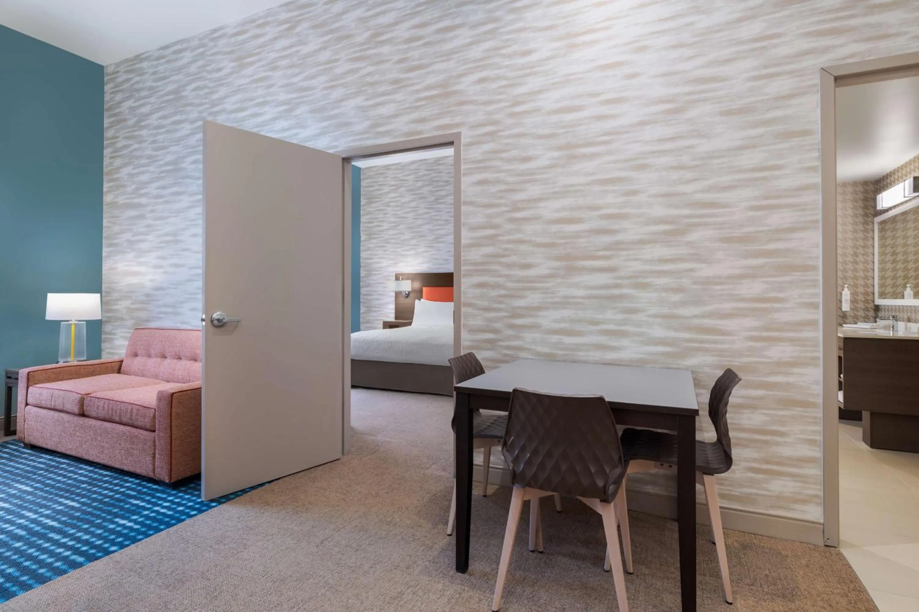 Living room, Bed in Home2 Suites By Hilton El Centro