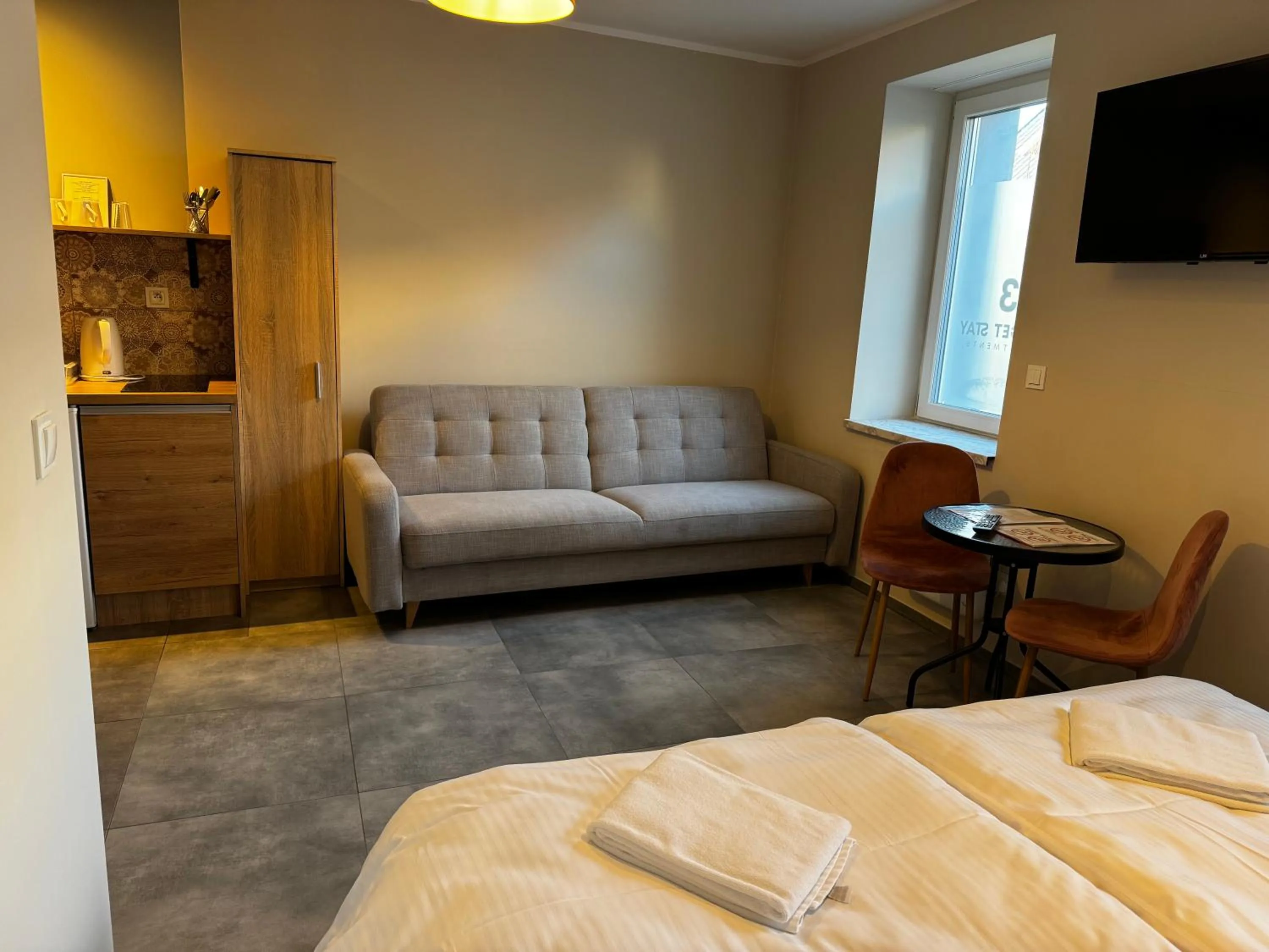 Bed in 3 Budget Stay Apartments