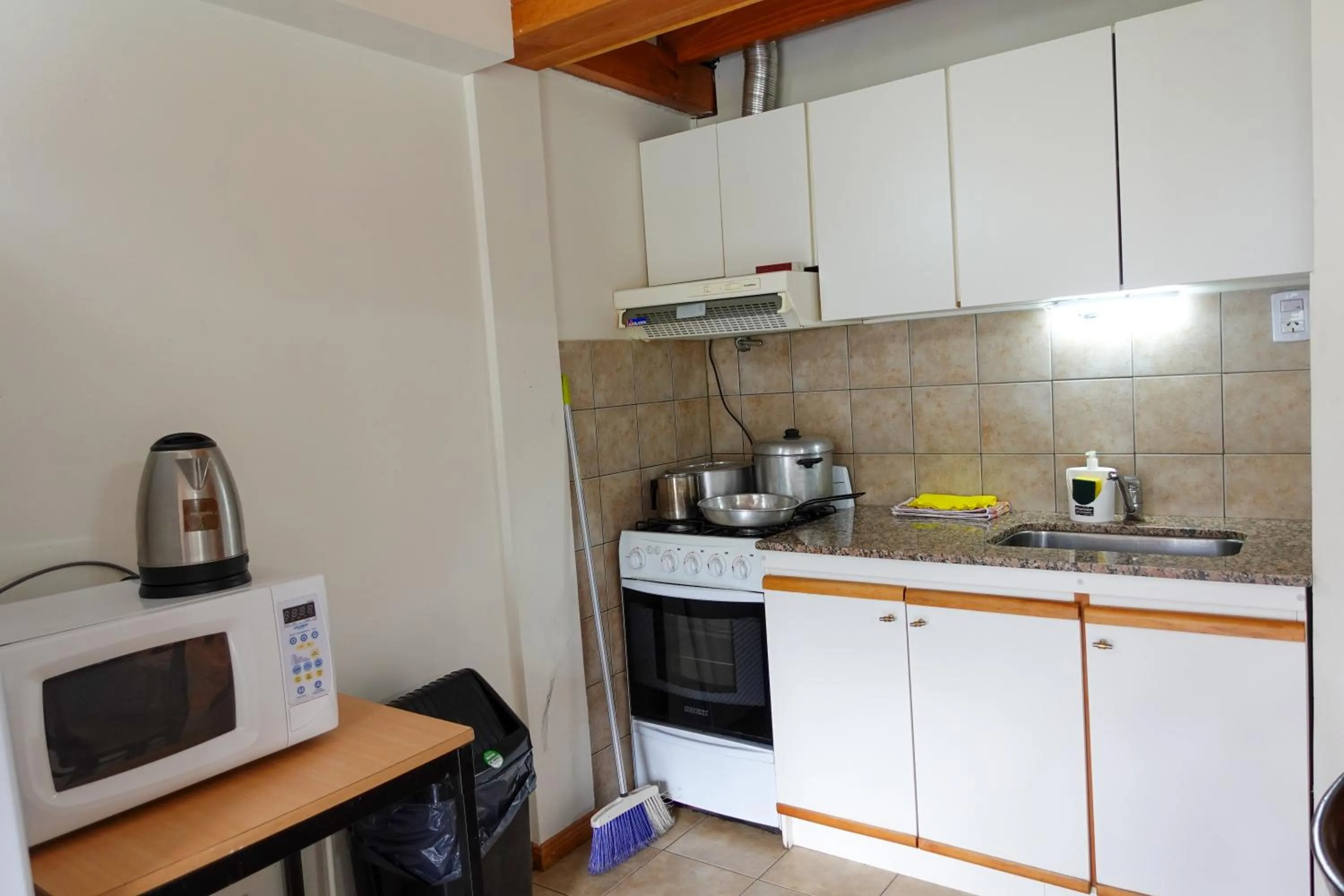 Kitchen or kitchenette in Choconcito Apart Hotel