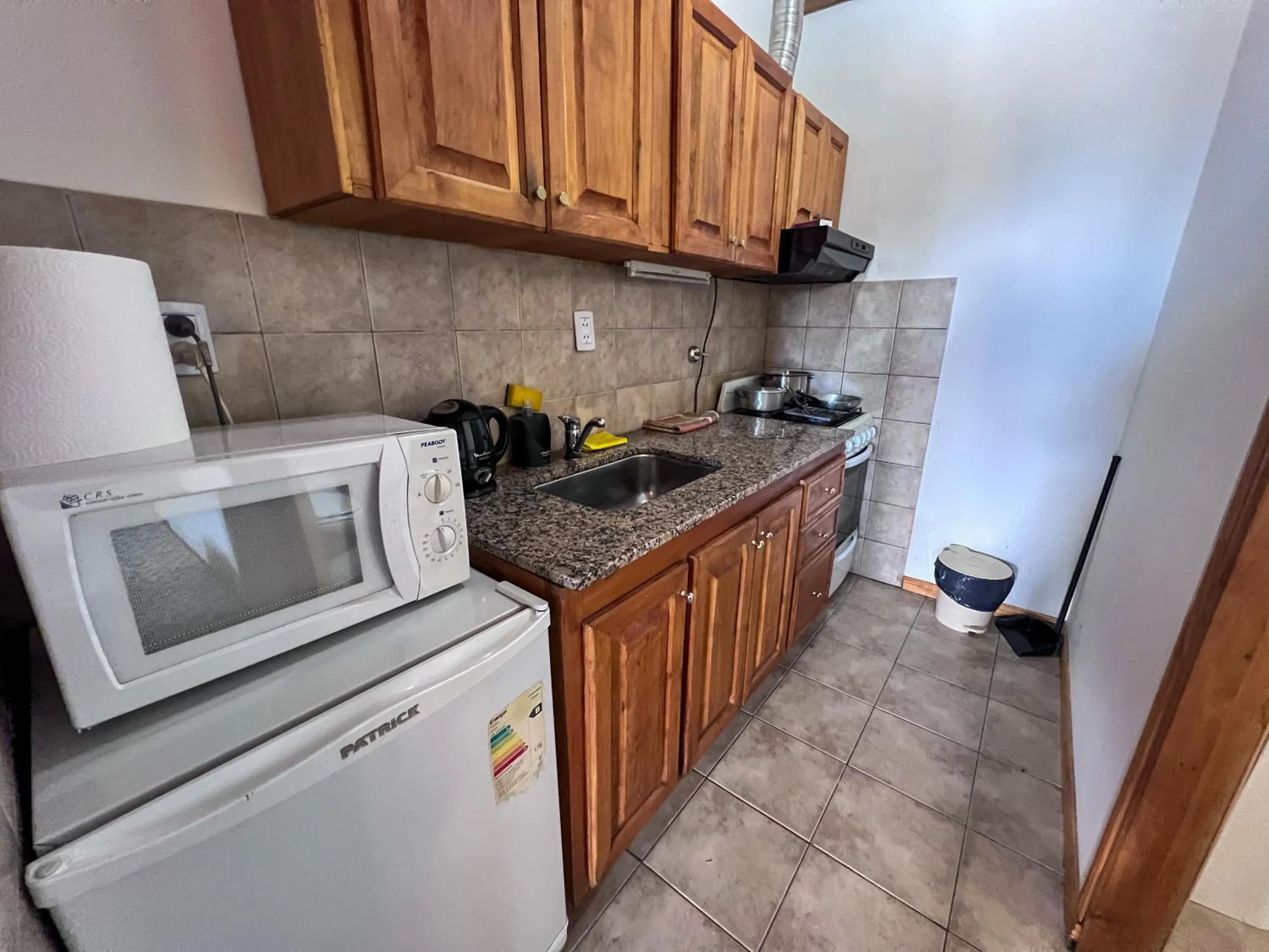 kitchen in Choconcito Apart Hotel