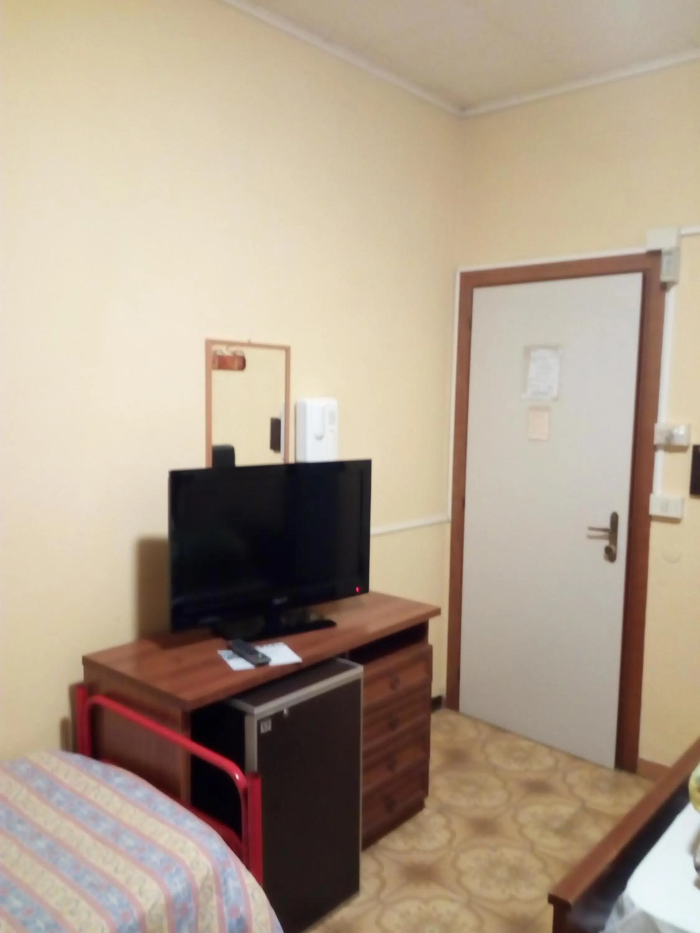 Photo of the whole room, TV/Entertainment Center in Albergo Da Peppino