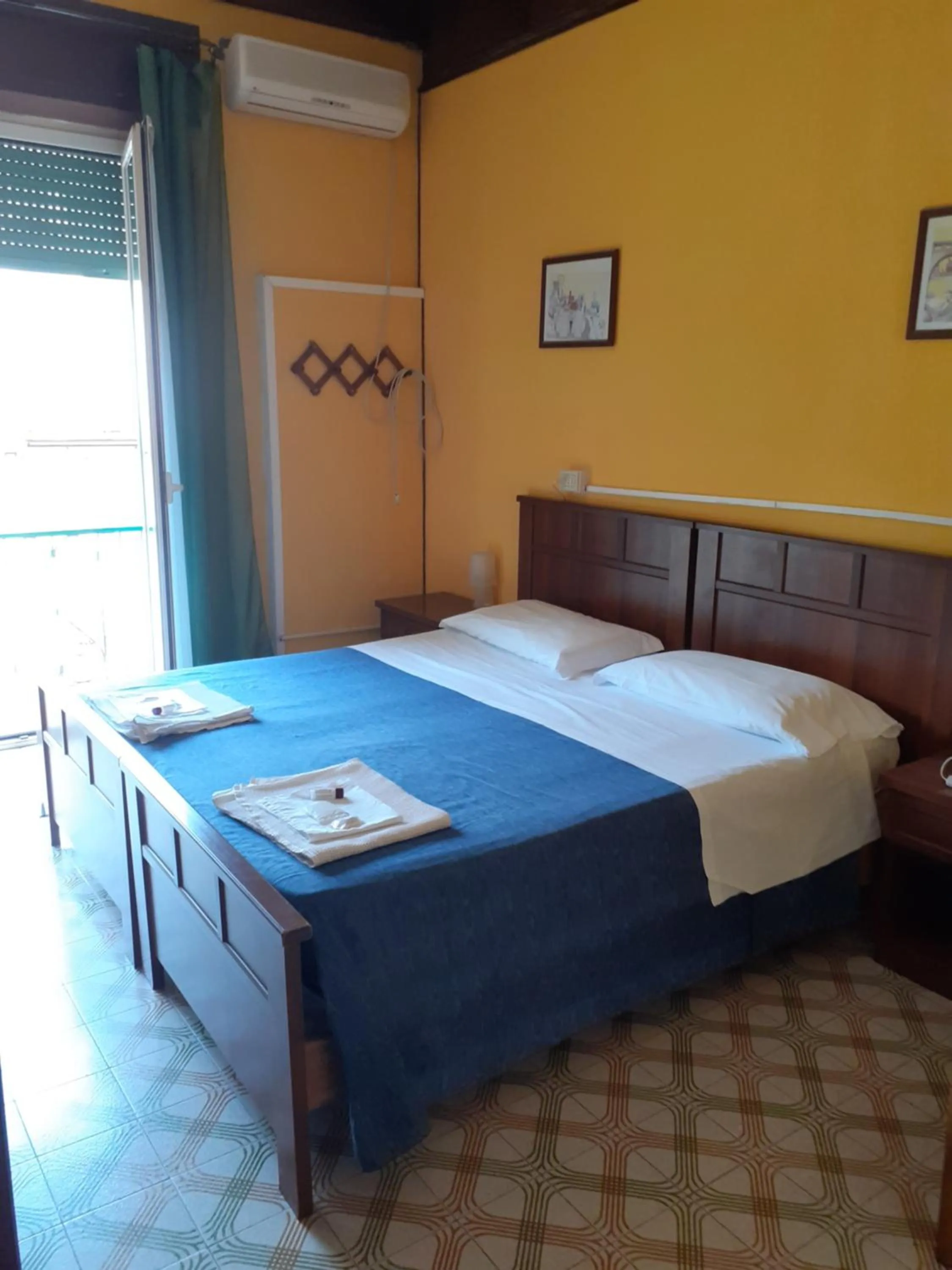 Bedroom in Albergo Da Peppino