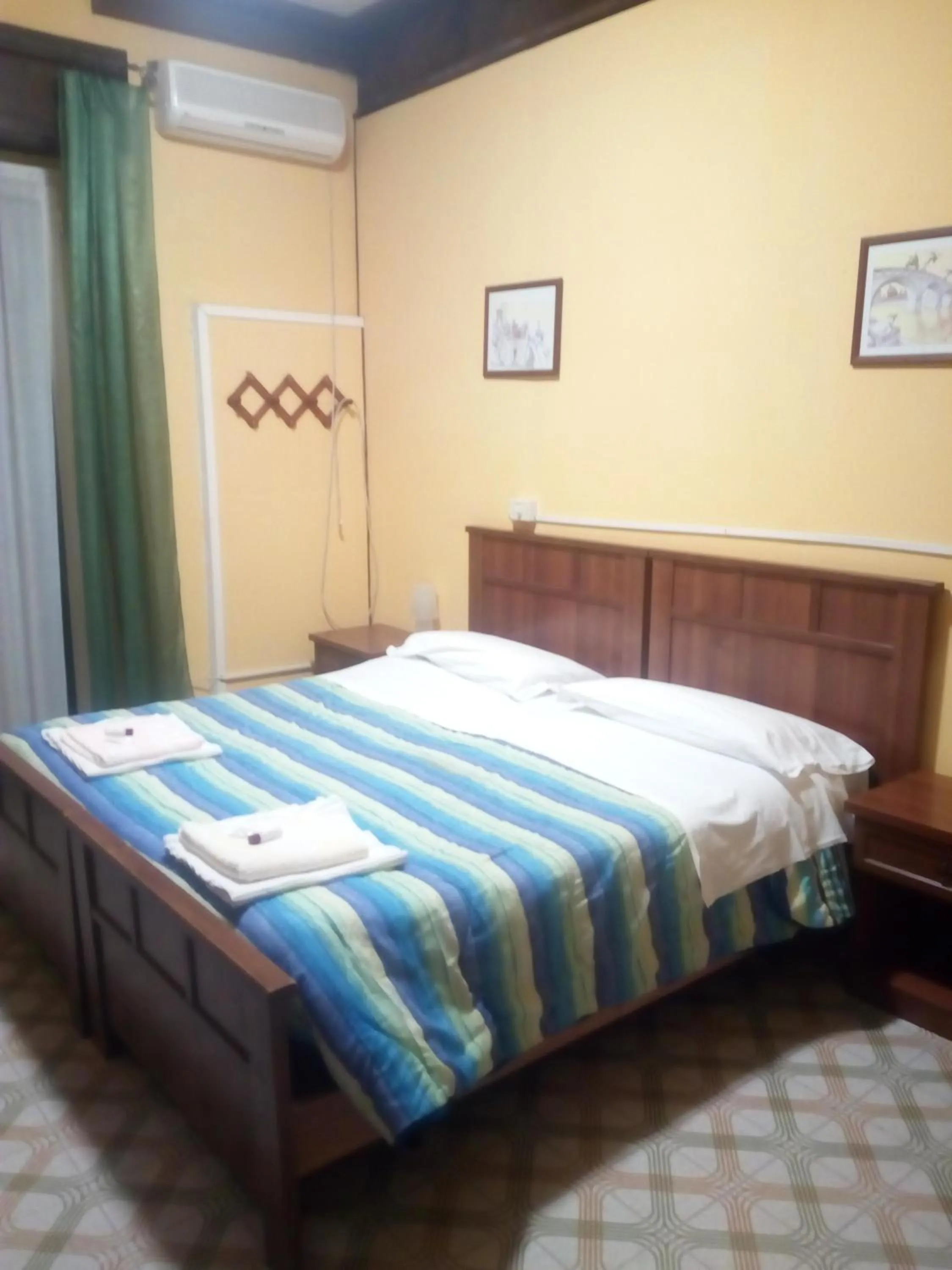 Bed in Albergo Da Peppino