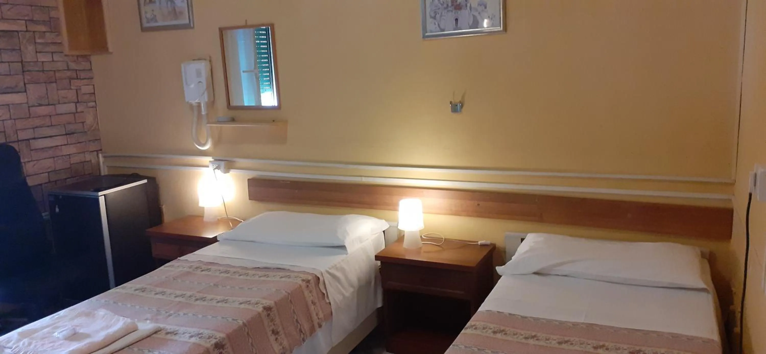 Bed in Albergo Da Peppino