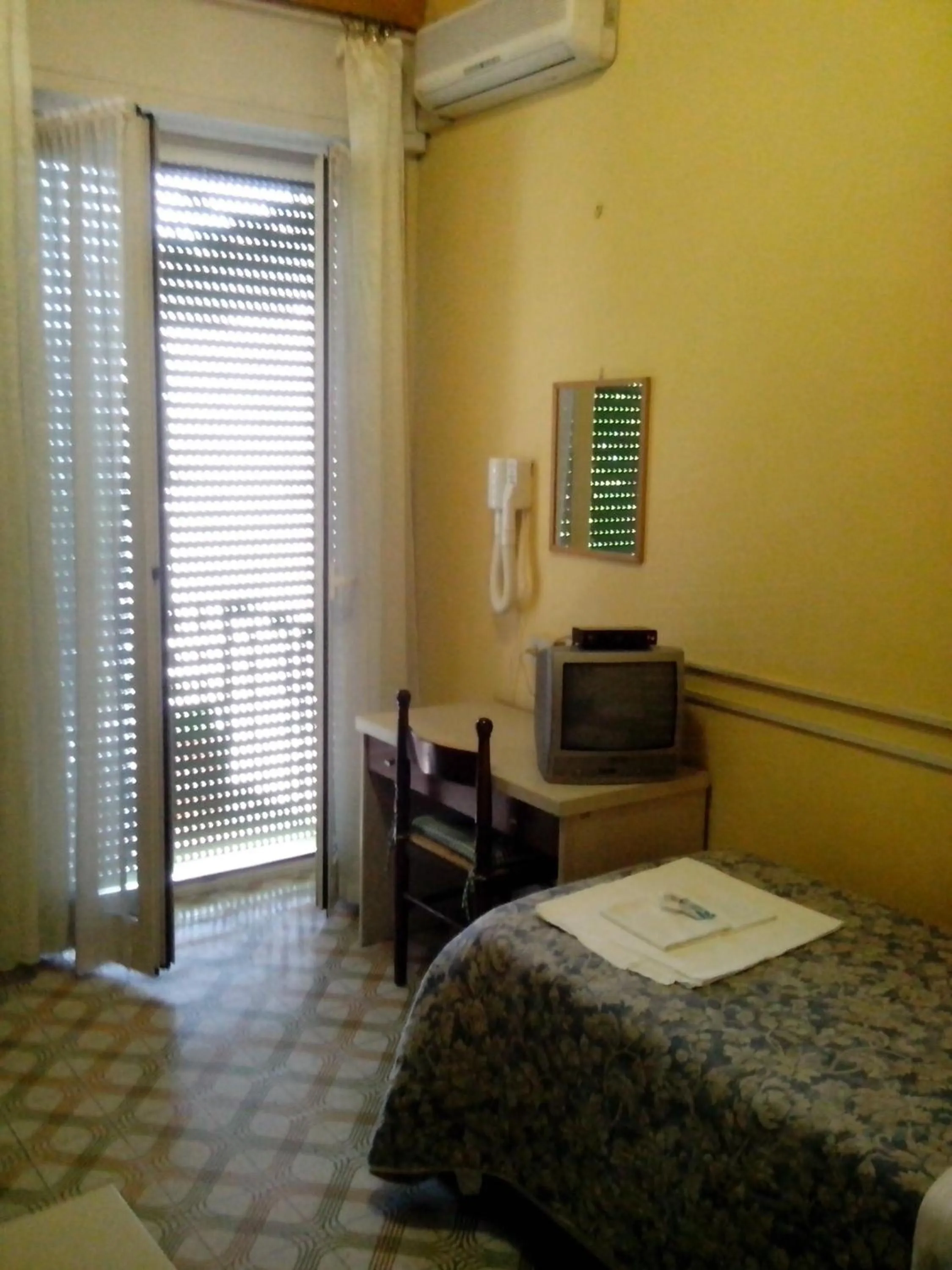 Photo of the whole room, TV/Entertainment Center in Albergo Da Peppino