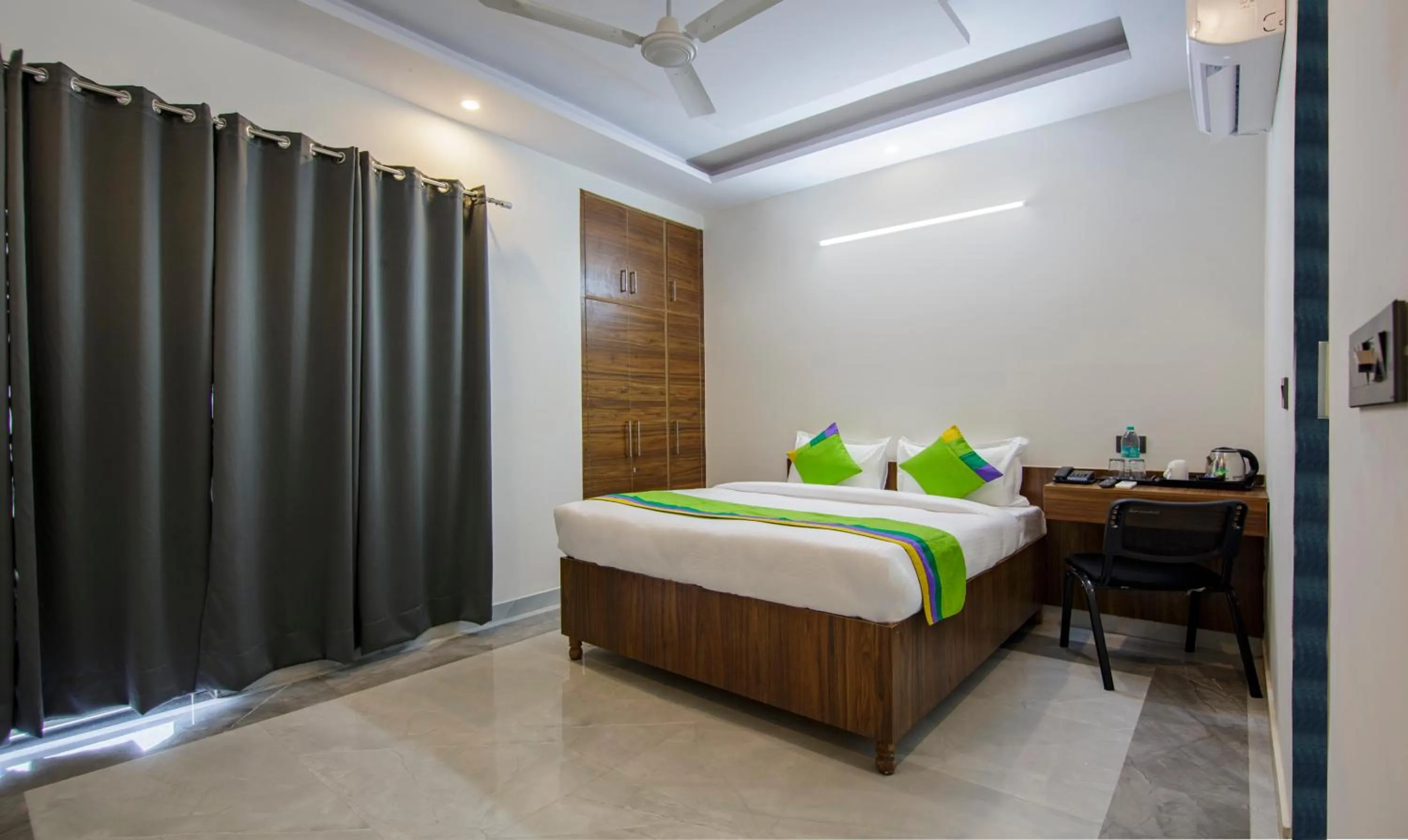 Bedroom, Bed in Treebo Grand Vista - 63A