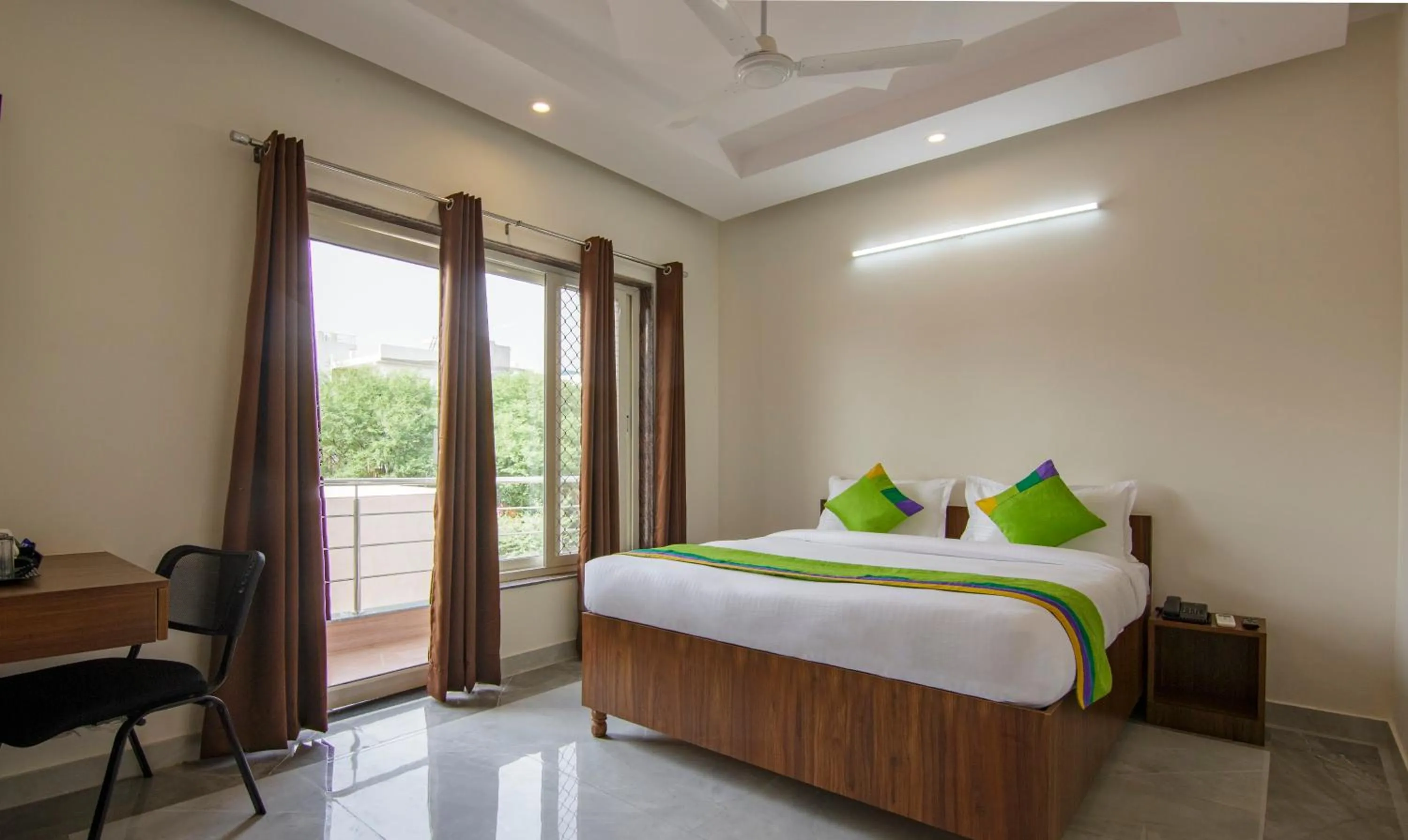 Photo of the whole room, Bed in Treebo Grand Vista - 63A