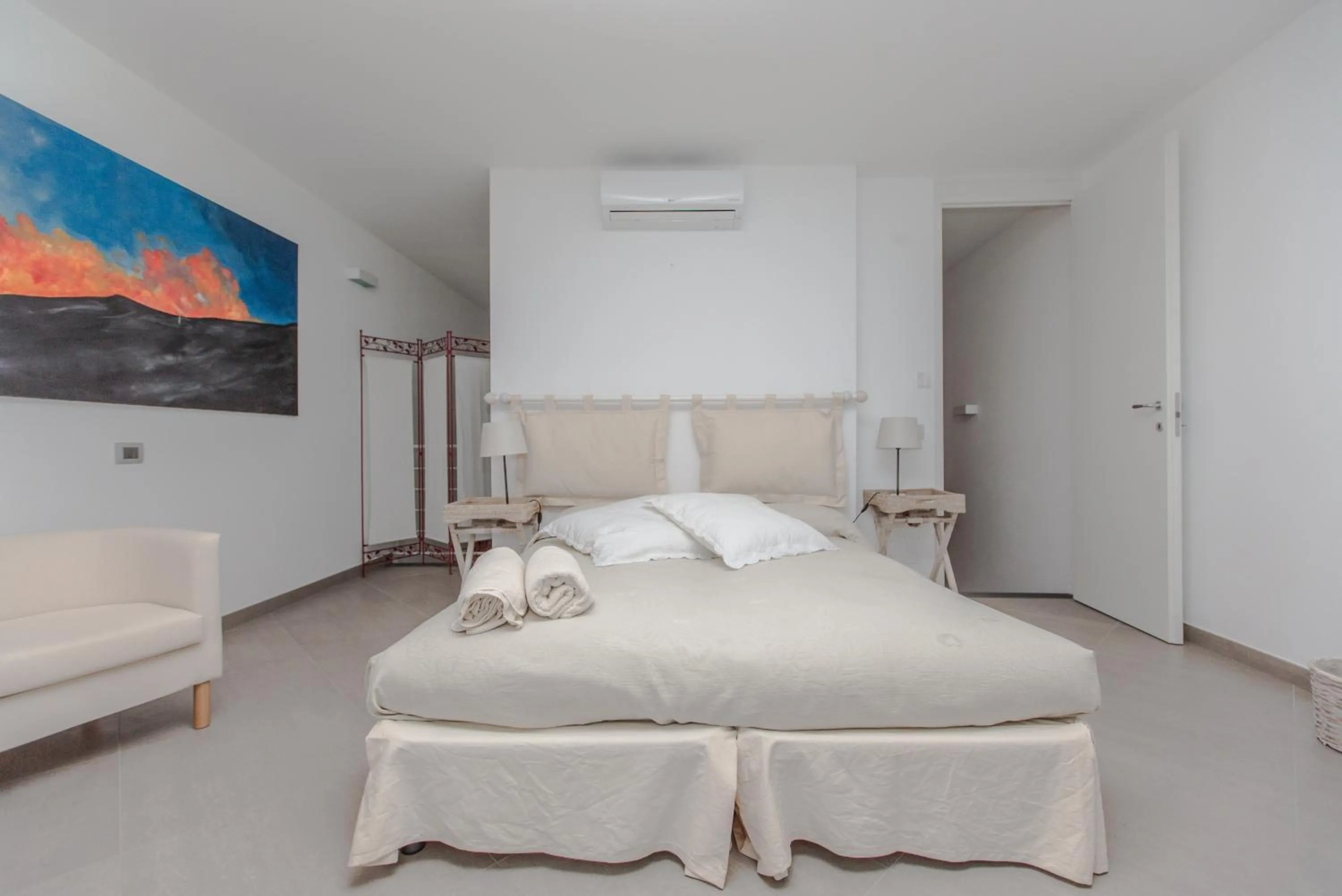 Bed in Il Gabbiano Relais in Stromboli