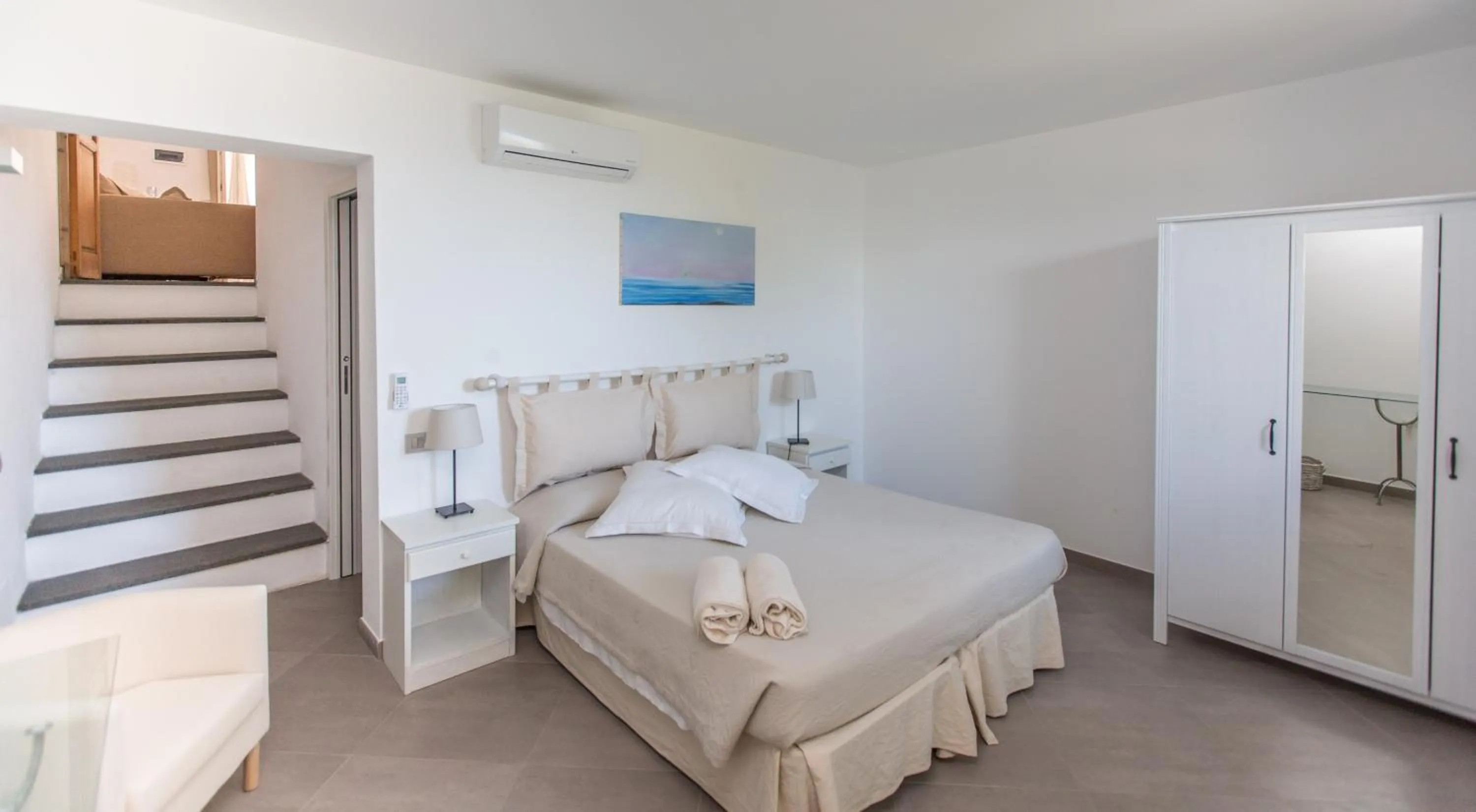 Bed in Il Gabbiano Relais in Stromboli