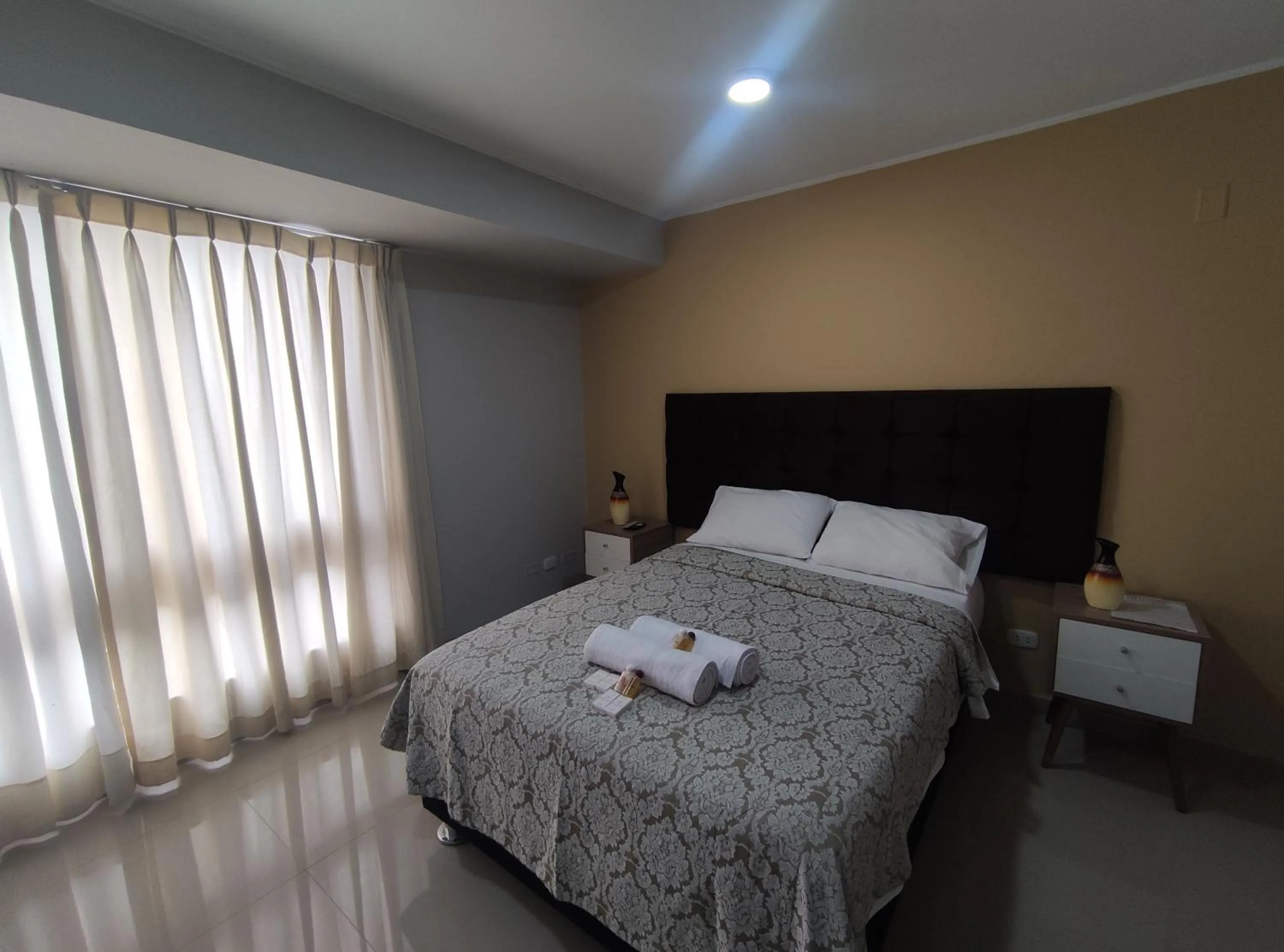 Photo of the whole room, Bed in Inti Llaqta Hotel & Suites
