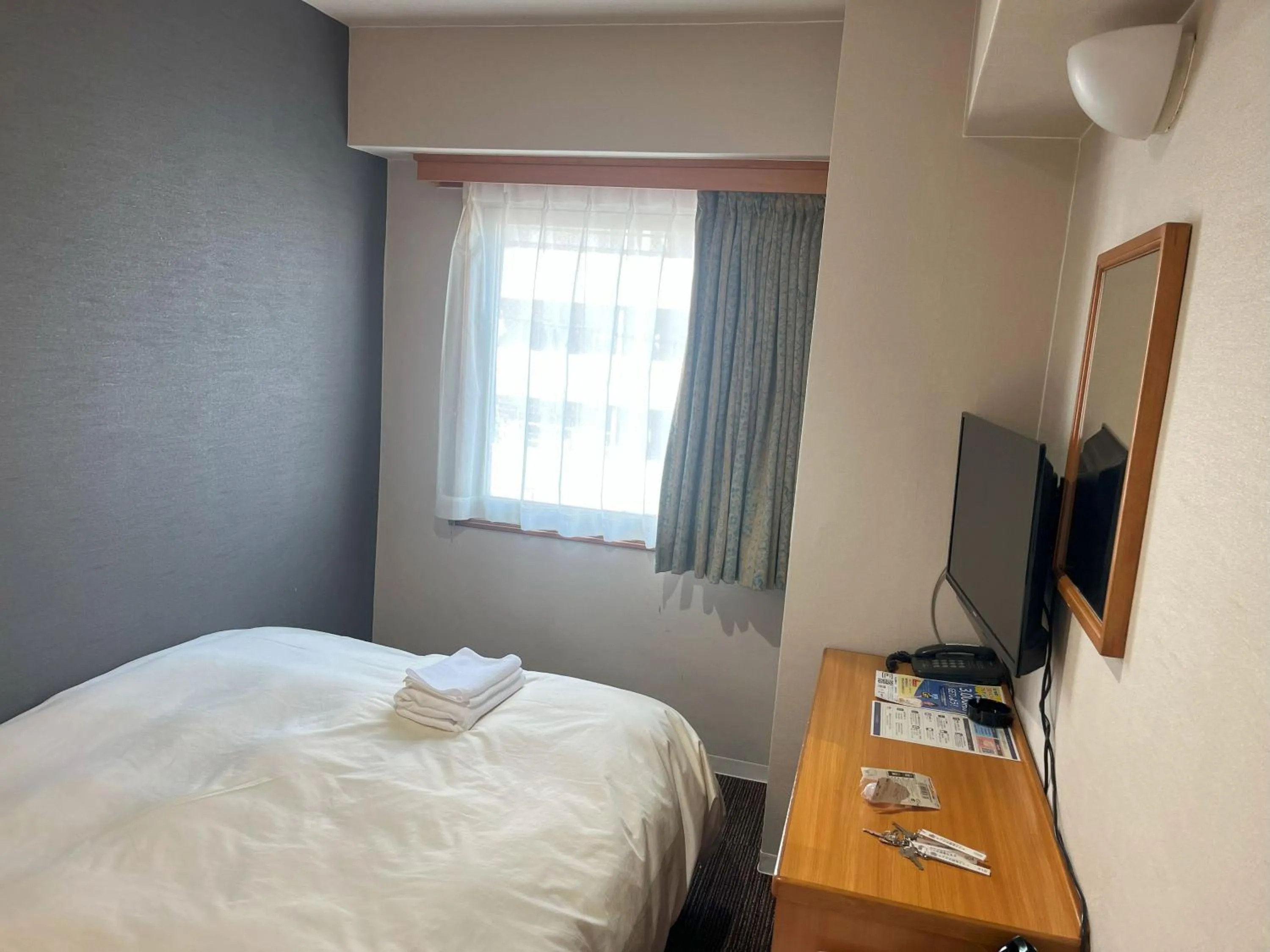 Bed in Hotel Kurume HIlls